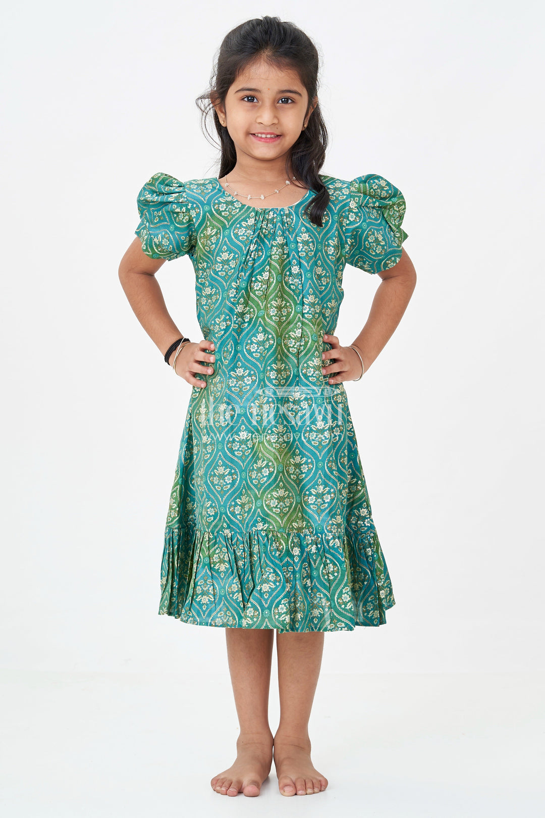 The Nesavu Girls Fancy Frock Girls Long Frock New Model in Green Modal Silk with Ornamental Digital Print and Puff Sleeves Nesavu Nesavu Green Modal Silk Long Frock New Model Ruffle Hem Puff Sleeves Girls
