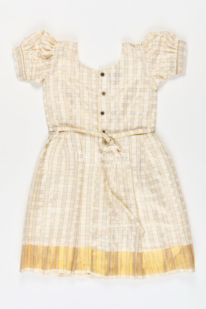 The Nesavu Silk Frock Girls Long Frock Simple in Beige Tissue Silk with Golden Pleats and Classic Bow Detail Nesavu Nesavu Girls Long Frock Simple Design Beige Silk Golden Pleats Bow Embellishment