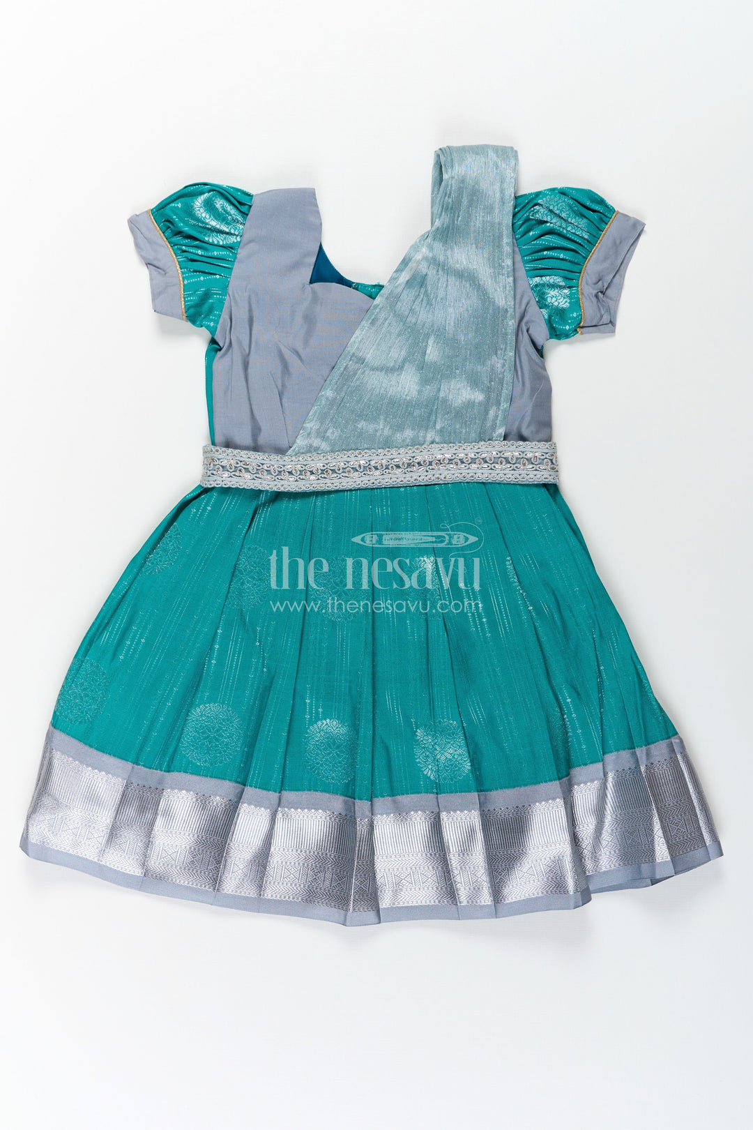 The Nesavu Girls Kanchi Silk Frock Girls Long Frock with Silk Dupatta in Semi Kanchivaram with Silver Zari and Green Brocade Pleated Elegance Nesavu Girls Long Frock with Silk Dupatta in Semi Kanchivaram with Silver Zari and Brocade Green Detail | The Nesavu
