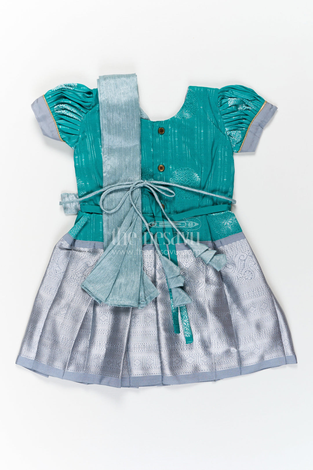 The Nesavu Girls Kanchi Silk Frock Girls Long Frock with Silk Dupatta in Semi Kanchivaram with Silver Zari and Green Brocade Pleated Elegance Nesavu Girls Long Frock with Silk Dupatta in Semi Kanchivaram with Silver Zari and Brocade Green Detail | The Nesavu