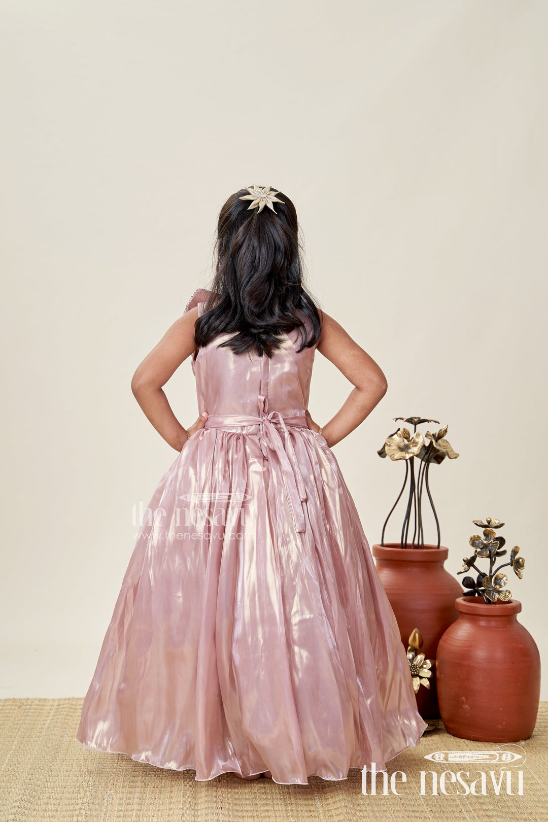 The Nesavu Girls Fancy Party Frock Girls Long Organza Gown with Sequins and Floral Motif Long Frock for Reception in Glossy Bronze Nesavu Nesavu Girls Long Bronze Gown Organza Sequin Detail long frock reception Style
