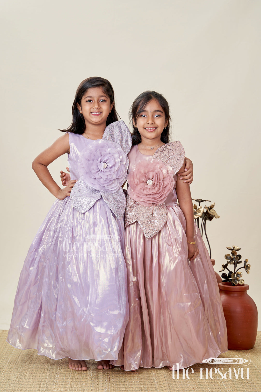 The Nesavu Girls Fancy Party Frock Girls Long Organza Gown with Sequins and Floral Motif Long Frock for Reception in Glossy Bronze Nesavu Nesavu Girls Long Bronze Gown Organza Sequin Detail long frock reception Style