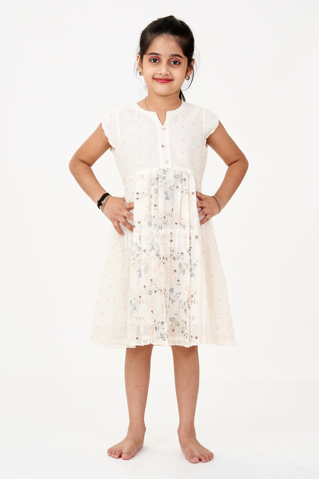 The Nesavu Girls Cotton Frock Girls Modern Frock in Cream Cotton Blend with Sequin Thread Embroidery and Pleated Hem Nesavu Girls Modern Frock Cream Cotton Sequin Thread Embroidery Soft Pleated Finish | The Nesavu