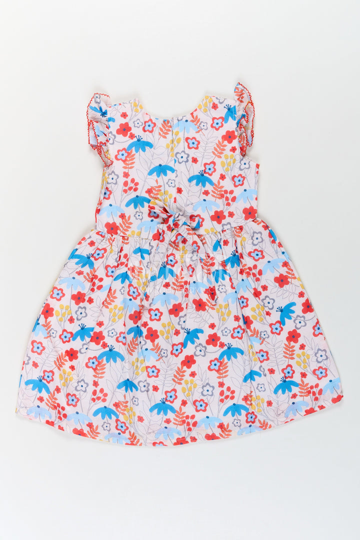 The Nesavu Girls Cotton Frock Girls Multicolor Frock in Flax Cotton with Bright Floral Digital Print and Front Button Detailing Nesavu Girls Multicolor Floral Printed Frock Flax Cotton Buttoned Front Sleeveless Style | The Nesavu
