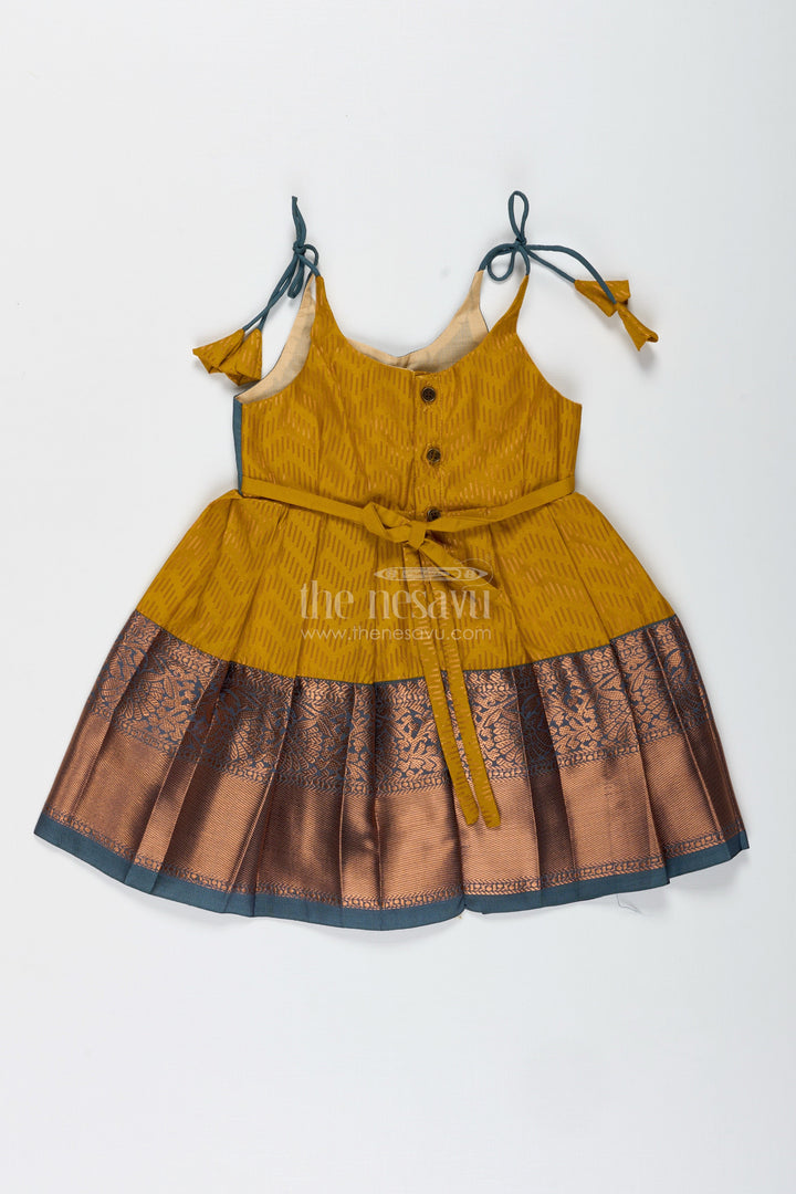 The Nesavu Tie-up Frock Girls Mustard and Brown Tie-Up Frock in Semi Kanchipuram Silk Ethnic Festive Wear Nesavu Mustard And Brown Semi Kanchipuram Silk Frock Festive Frock For Girls