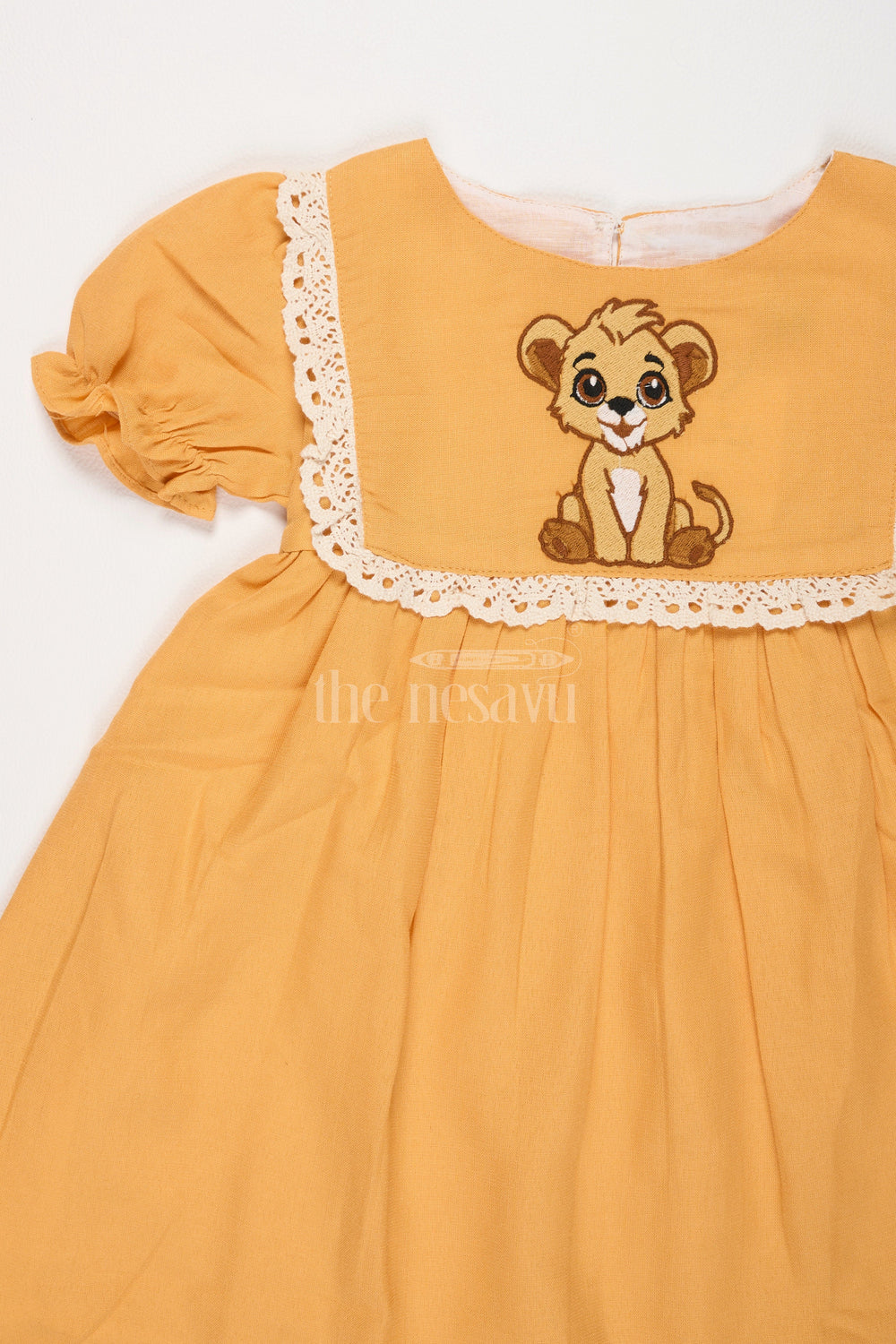 The Nesavu Girls Cotton Frock Girls Mustard Cotton Frock with Embroidered Yoke and Puff Sleeves in Simple Frock Design Cotton Look Nesavu Nesavu Girls Cotton Frock Mustard Embroidered Front Puff Sleeves frock design cotton