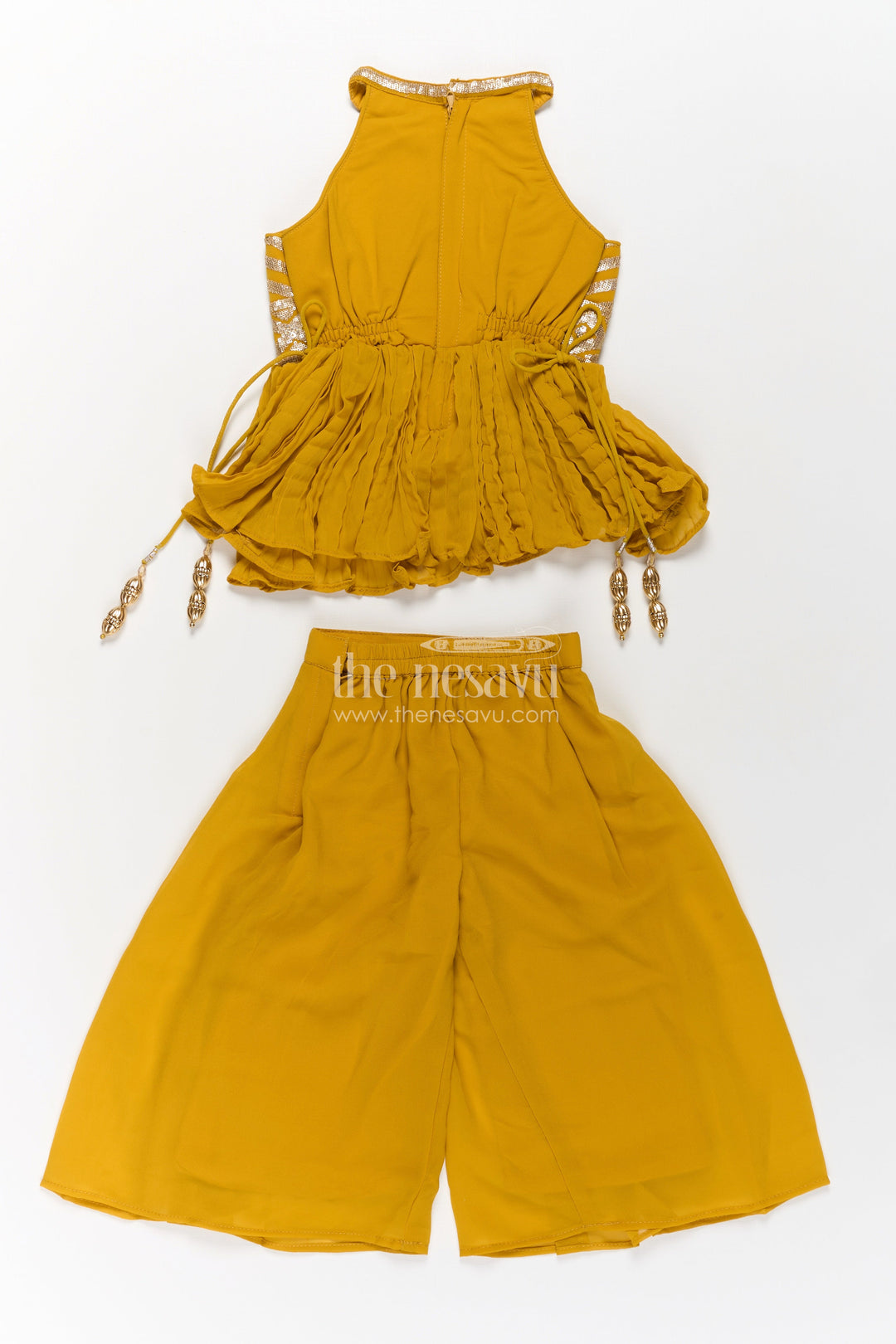The Nesavu Girls Sharara / Plazo Set Girls Mustard Dress with Sharara in Georgette Featuring Ruffle Hem and Shimmering Chevron Design Nesavu Mustard Dress Sharara Girls Georgette Chevron Embroidery Ruffle Detail | The Nesavu