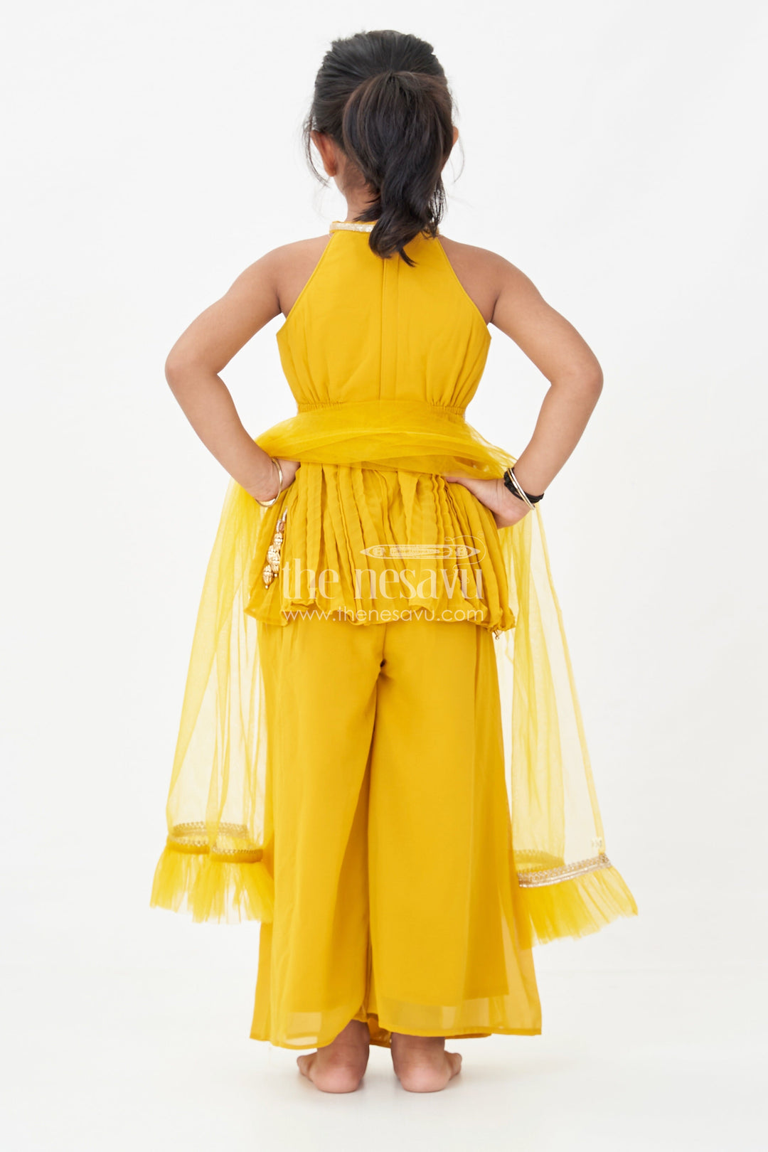 The Nesavu Girls Sharara / Plazo Set Girls Mustard Dress with Sharara in Georgette Featuring Ruffle Hem and Shimmering Chevron Design Nesavu Mustard Dress Sharara Girls Georgette Chevron Embroidery Ruffle Detail | The Nesavu