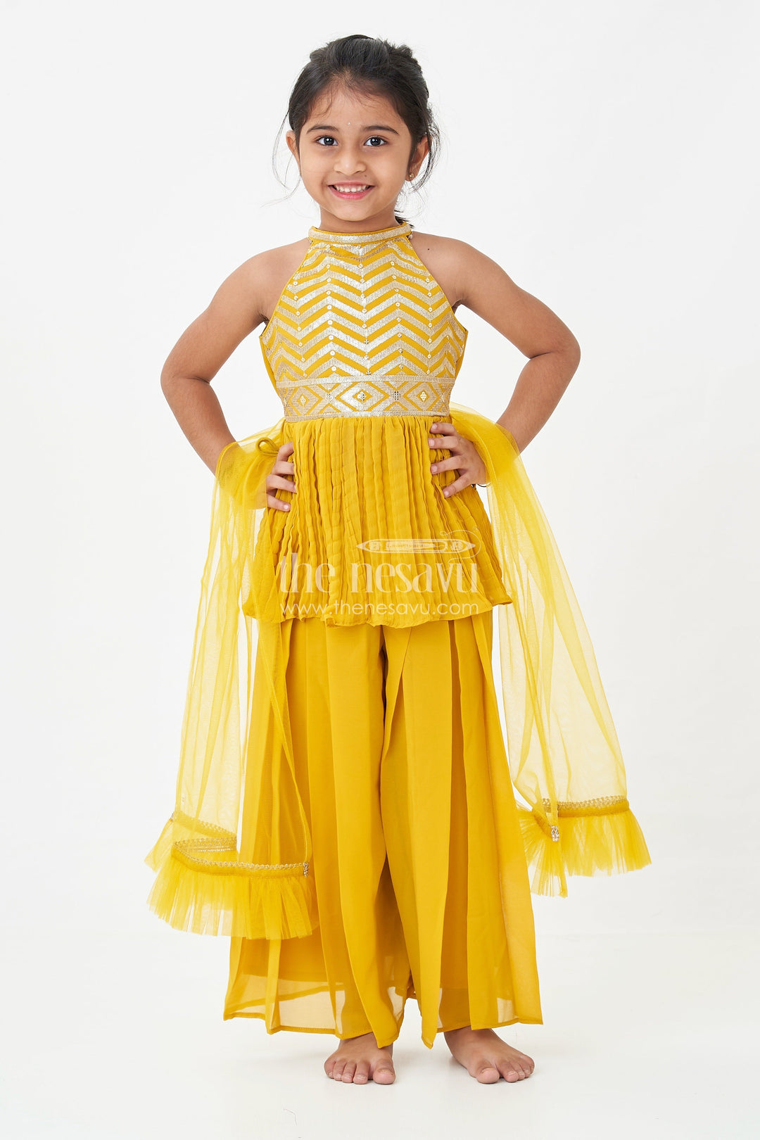 The Nesavu Girls Sharara / Plazo Set Girls Mustard Dress with Sharara in Georgette Featuring Ruffle Hem and Shimmering Chevron Design Nesavu Mustard Dress Sharara Girls Georgette Chevron Embroidery Ruffle Detail | The Nesavu