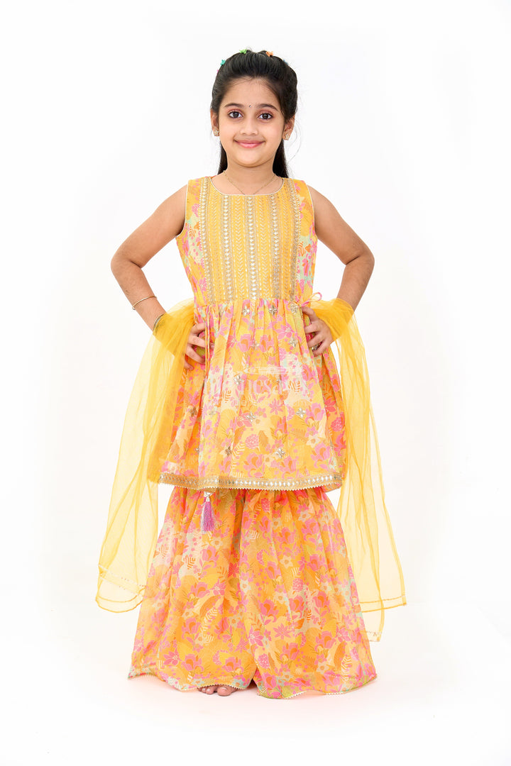 The Nesavu Girls Sharara / Plazo Set Girls Mustard Ethnic Sharara Dress with Floral Print and Sequin Detailing Nesavu 16 (1Y) / Yellow GPS505A-16 Girls Mustard Sharara Dress Floral Print Sequin Embroidery Weddings | The Nesavu