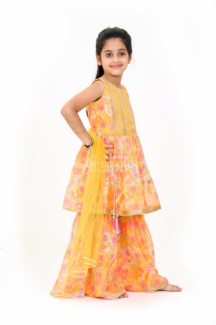 The Nesavu Girls Sharara / Plazo Set Girls Mustard Ethnic Sharara Dress with Floral Print and Sequin Detailing Nesavu Girls Mustard Sharara Dress Floral Print Sequin Embroidery Weddings | The Nesavu
