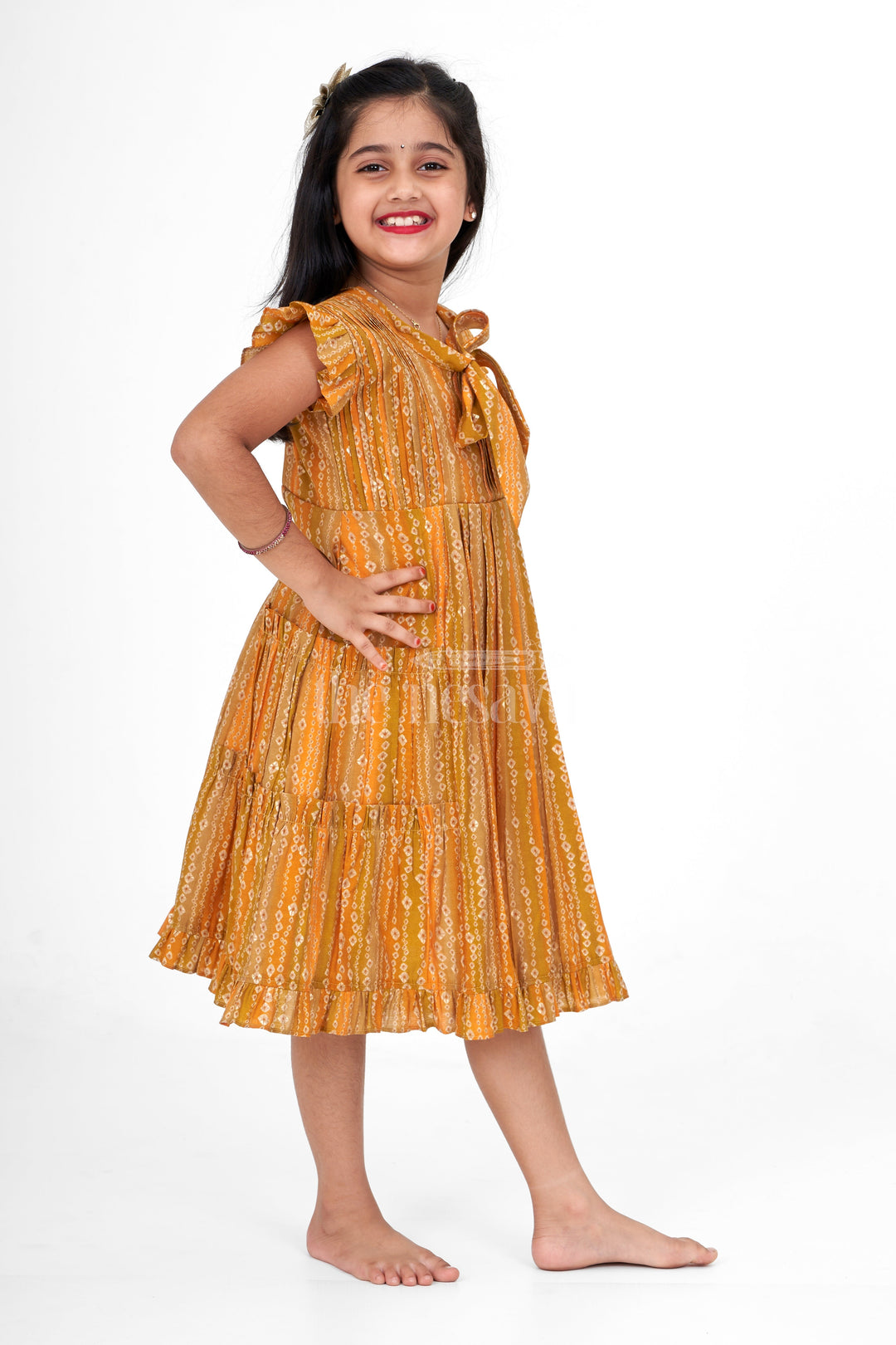 The Nesavu Girls Cotton Frock Girls Mustard Yellow Cotton Frock with Ikat Print and Ruffle Sleeves for Summer Nesavu Nesavu Girls Mustard Yellow Cotton Frock Ikat Print Ruffle Sleeves