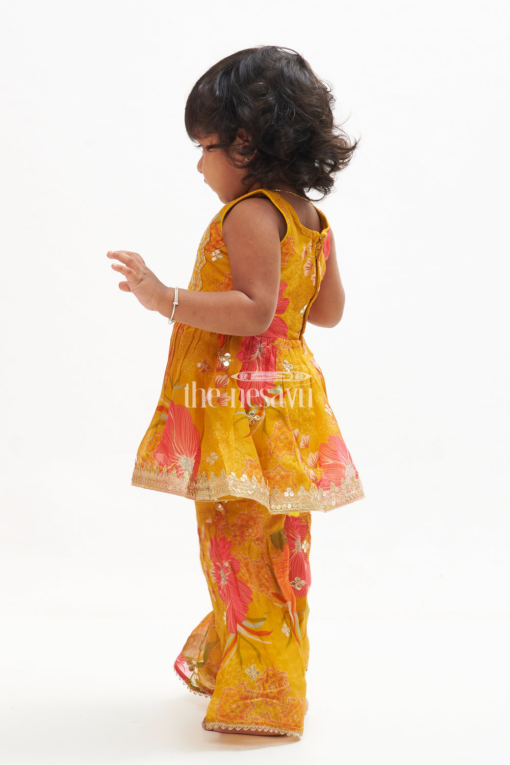 The Nesavu Girls Sharara / Plazo Set Girls' Mustard Yellow Floral Organza Garara Set with Embroidery and Samosa Lace Nesavu Mustard Yellow Floral Organza Garara Set with Embroidery for Girls