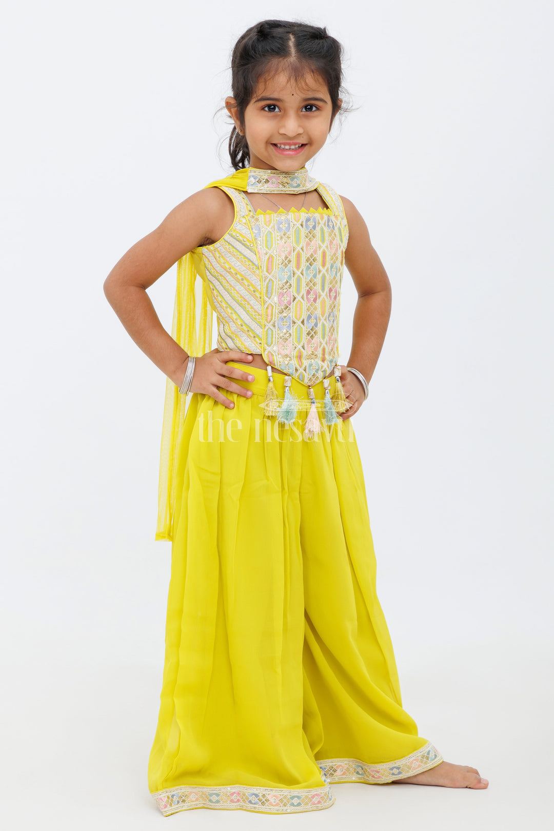 The Nesavu Girls Sharara / Plazo Set Girls Mustard Yellow Sharara Set with Sleeveless Embroidered Crop Top and Tassel Details Nesavu 0ef30a472b68jpgv1726571211