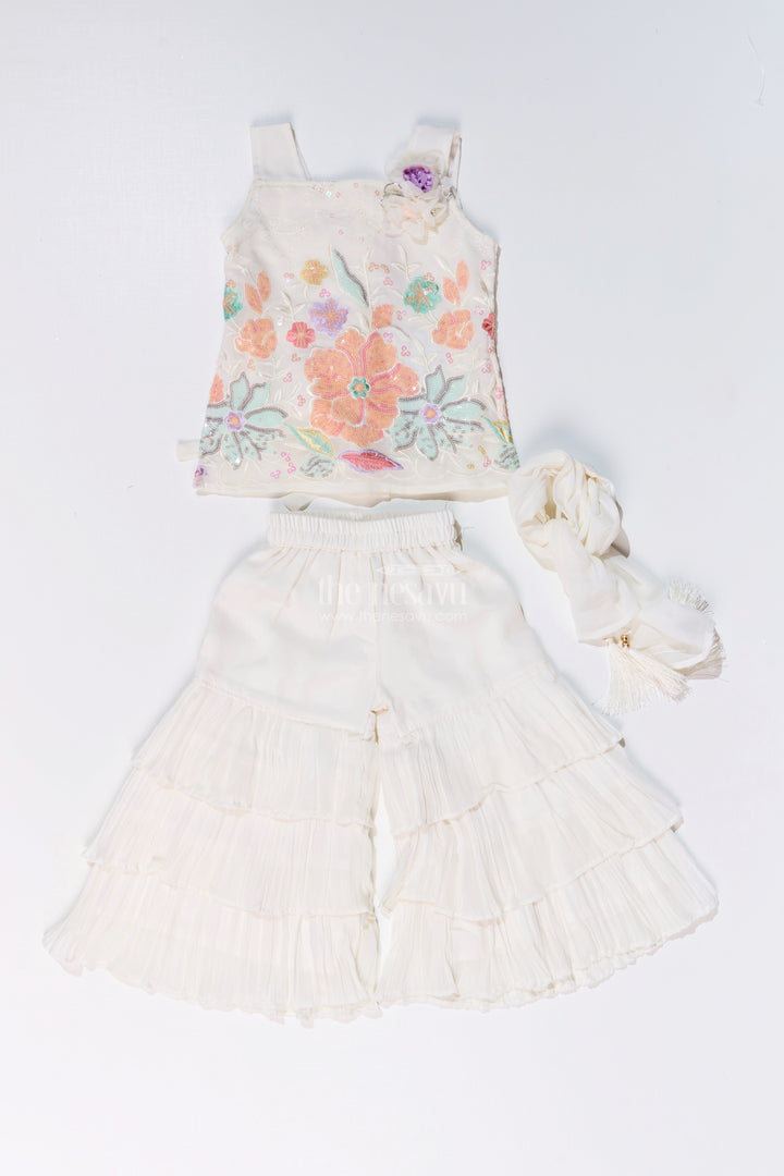 The Nesavu Girls Sharara / Plazo Set Girls Off White Sharara with Floral Embroidered Top and Layered Ruffle Pants Nesavu Girls Off White Sharara Floral Embroidered Top Layered Ruffle Pants | The Nesavu