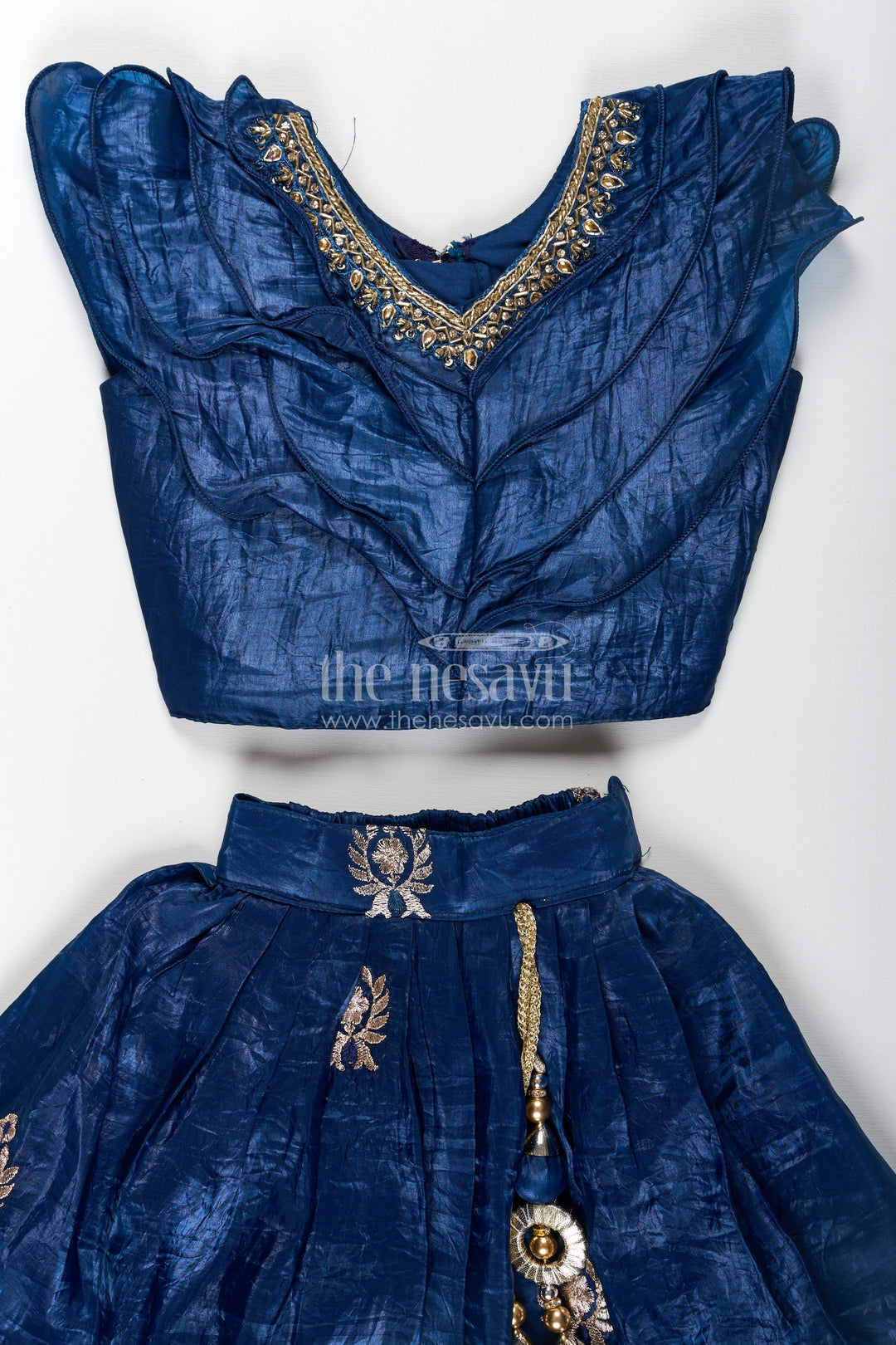 The Nesavu Girls Lehenga Choli Girls Party Dress in Navy Blue Organza Lehenga Choli with Elegant Zari Work and Flared Silhouette Nesavu Girl Party Dress in Navy Blue Organza Lehenga with Golden Zari Embroidery and Ruffle Blouse | The Nesavu