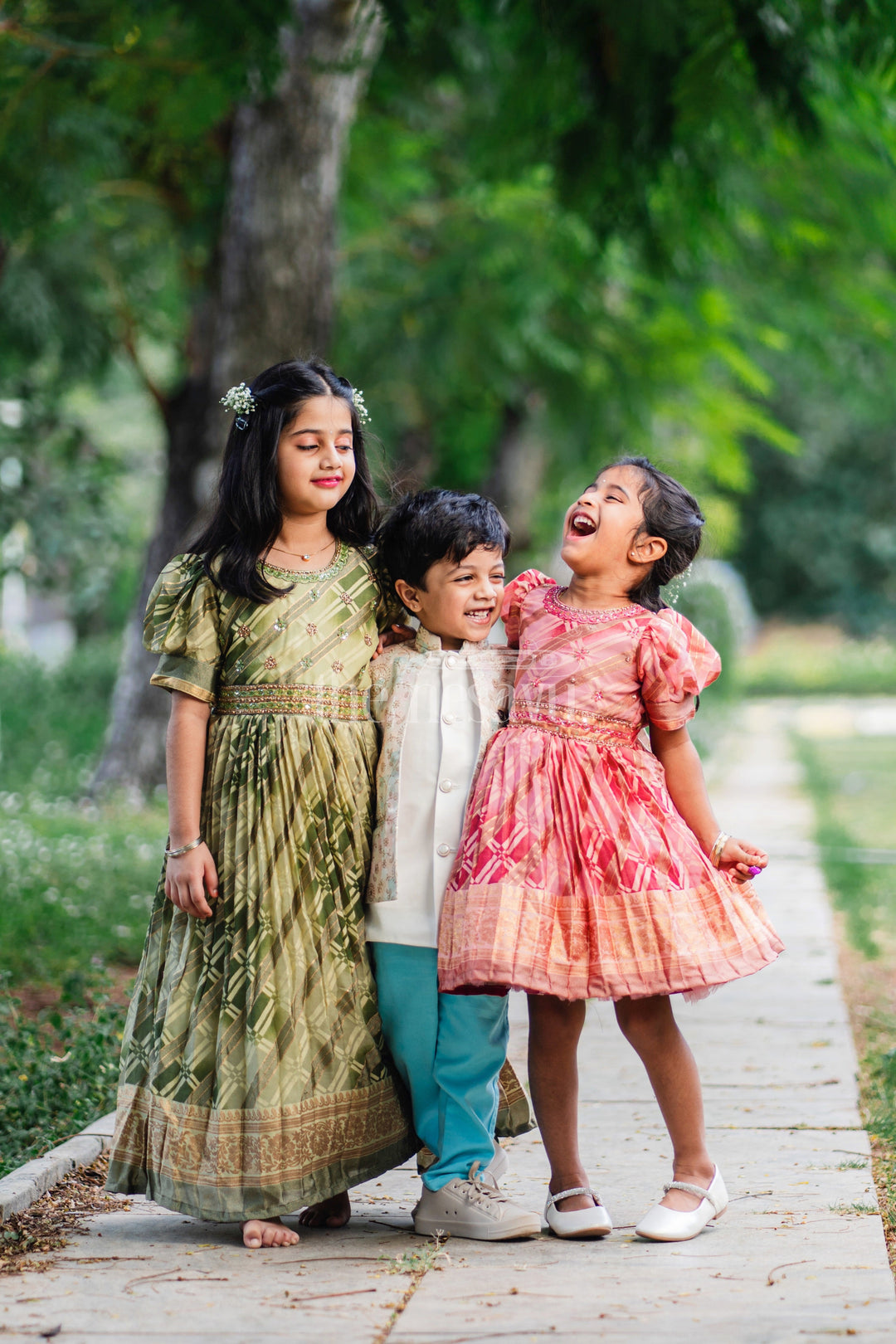 The Nesavu Girls Party Gown Girls Party Gown in Green Tissue Silk with Golden Floral Motifs and Pleated Full-Length Skirt Nesavu Nesavu Girls Party Gown Green Tissue Silk Floral Embellishments Pleated Skirt