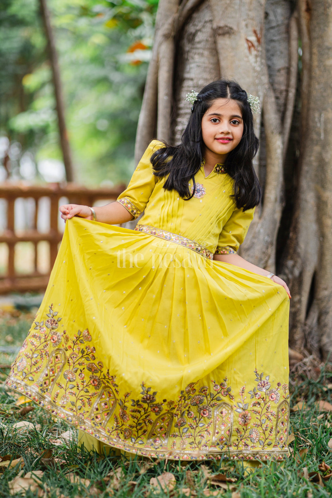 The Nesavu Girls Party Gown Girls Party Gown in Mustard Tissue Silk with Puff Sleeves and Floral Embroidery Nesavu Nesavu Girls Mustard Party Gown Floral Embroidery Puff Sleeves Tissue Silk