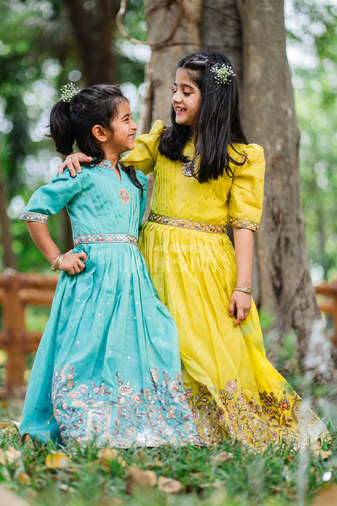 The Nesavu Girls Party Gown Girls Party Gown in Mustard Tissue Silk with Puff Sleeves and Floral Embroidery Nesavu Nesavu Girls Mustard Party Gown Floral Embroidery Puff Sleeves Tissue Silk