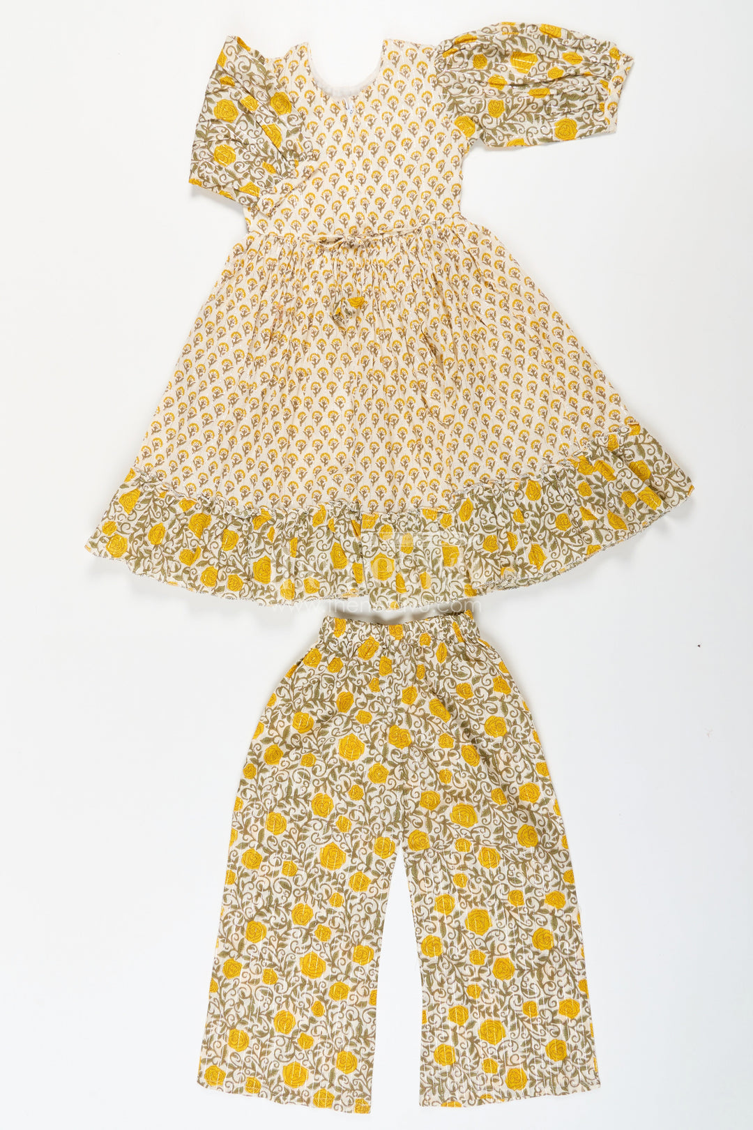 The Nesavu Girls Sharara / Plazo Set Girls Partywear Sharara Set in Yellow Floral Cotton with Mirror and Thread Embroidery Accents Nesavu Girls Partywear Sharara Set with Mirror Embroidery and Yellow Floral Printed Cotton Co-Ord Look | The Nesavu