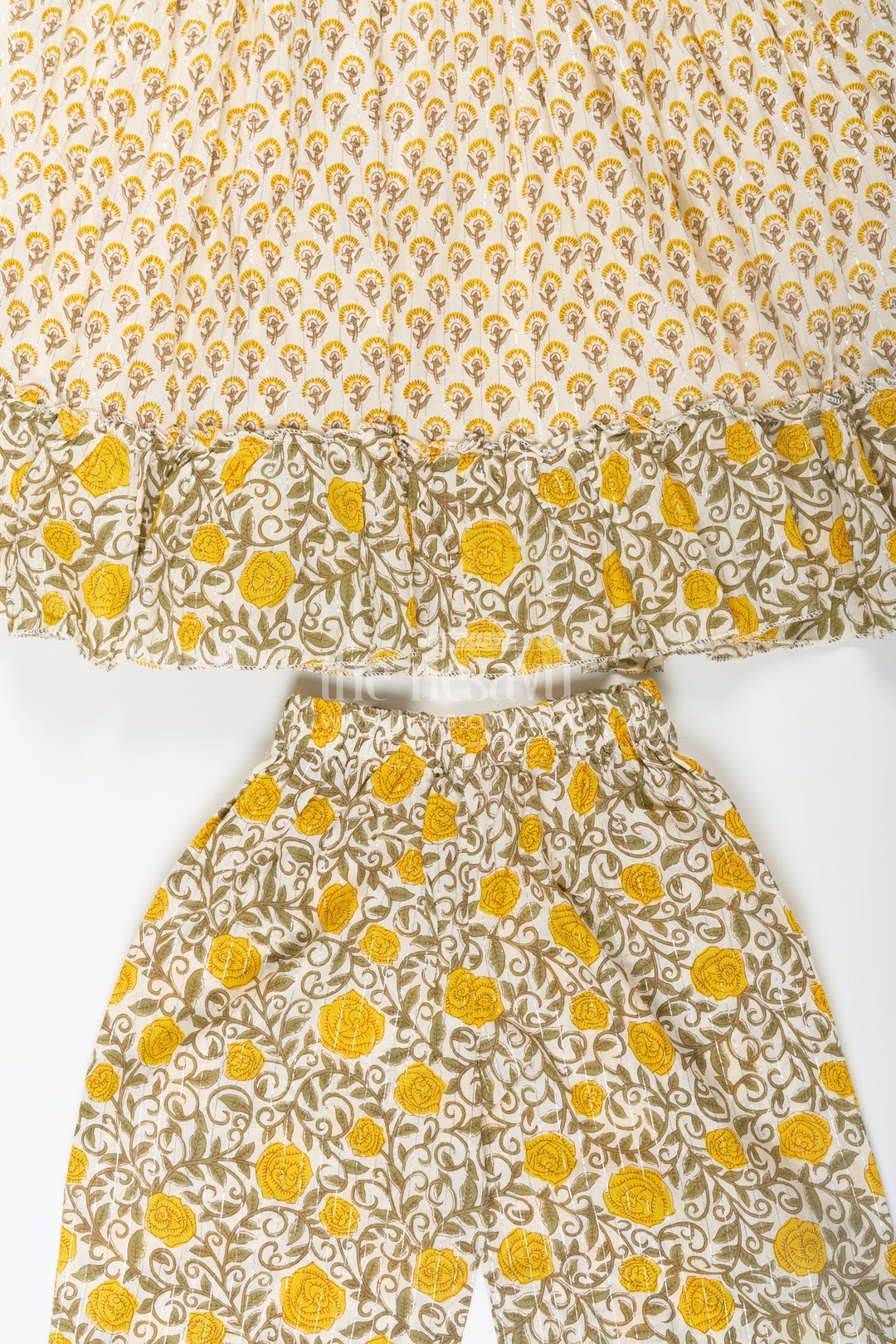 The Nesavu Girls Sharara / Plazo Set Girls Partywear Sharara Set in Yellow Floral Cotton with Mirror and Thread Embroidery Accents Nesavu Girls Partywear Sharara Set with Mirror Embroidery and Yellow Floral Printed Cotton Co-Ord Look | The Nesavu