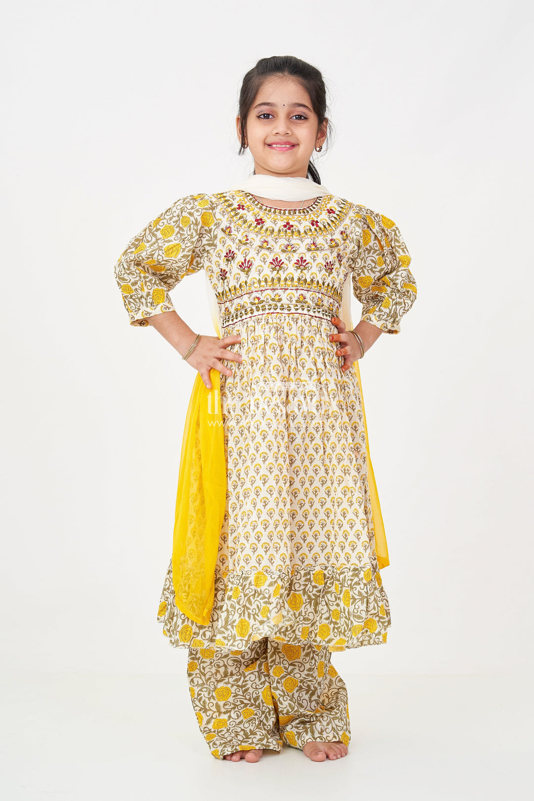 The Nesavu Girls Sharara / Plazo Set Girls Partywear Sharara Set in Yellow Floral Cotton with Mirror and Thread Embroidery Accents Nesavu Girls Partywear Sharara Set with Mirror Embroidery and Yellow Floral Printed Cotton Co-Ord Look | The Nesavu