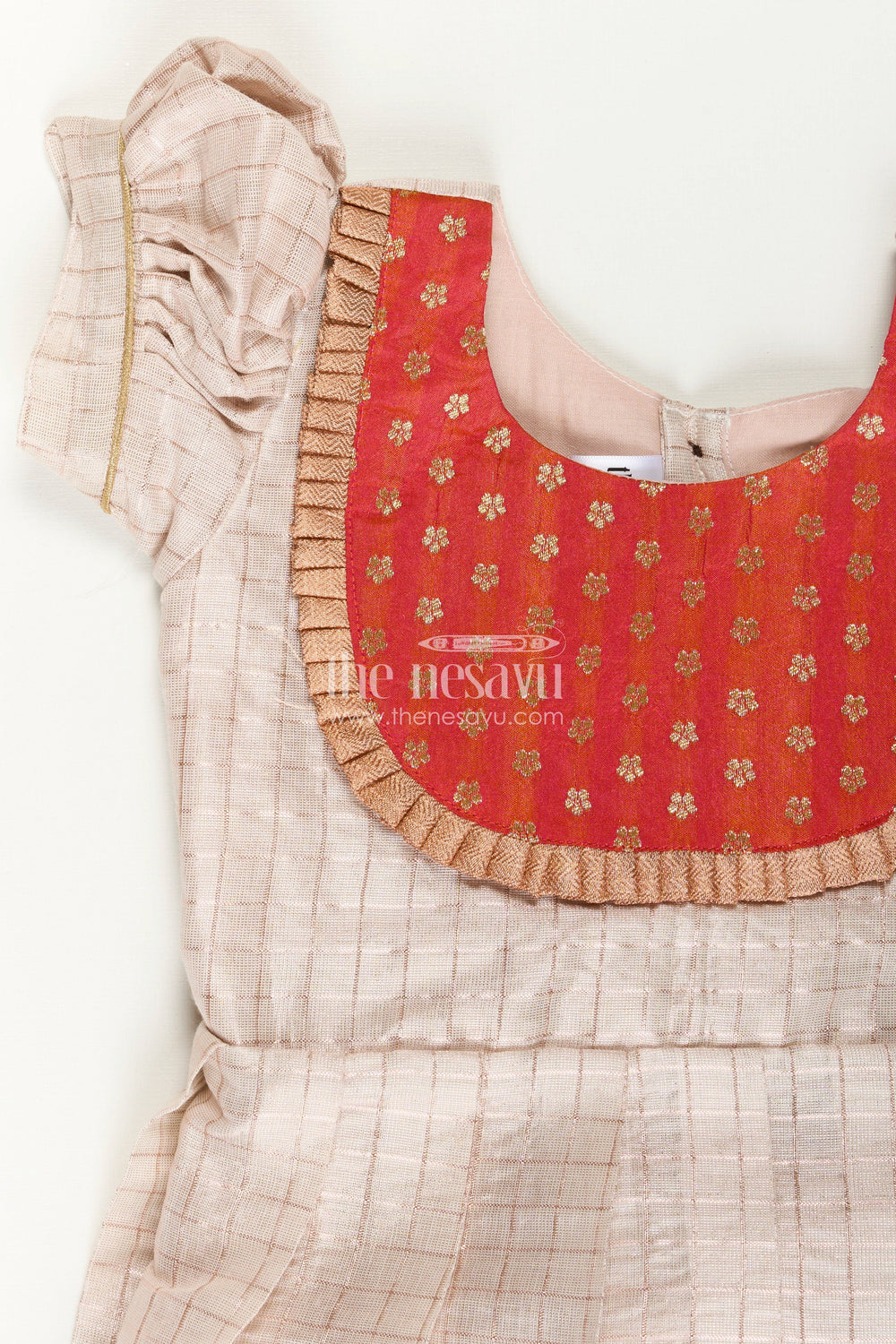 The Nesavu Silk Frock Girls Pattu Designs in Beige Silk with Red Semi Banaras Yoke and Pleated Finish Nesavu Nesavu Girls Pattu Designs Beige Silk Frock Red Banaras Embellished Yoke Pleated Style