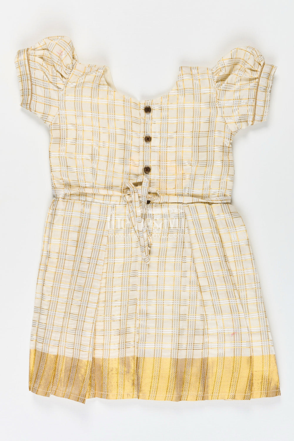 The Nesavu Silk Frock Girls Pattu Frock in Beige Tissue with Gold Bow and Checked Design for Festive Elegance Nesavu Nesavu Girls Pattu Frock Beige Silk Gold Checked Weave Bow Embellishment
