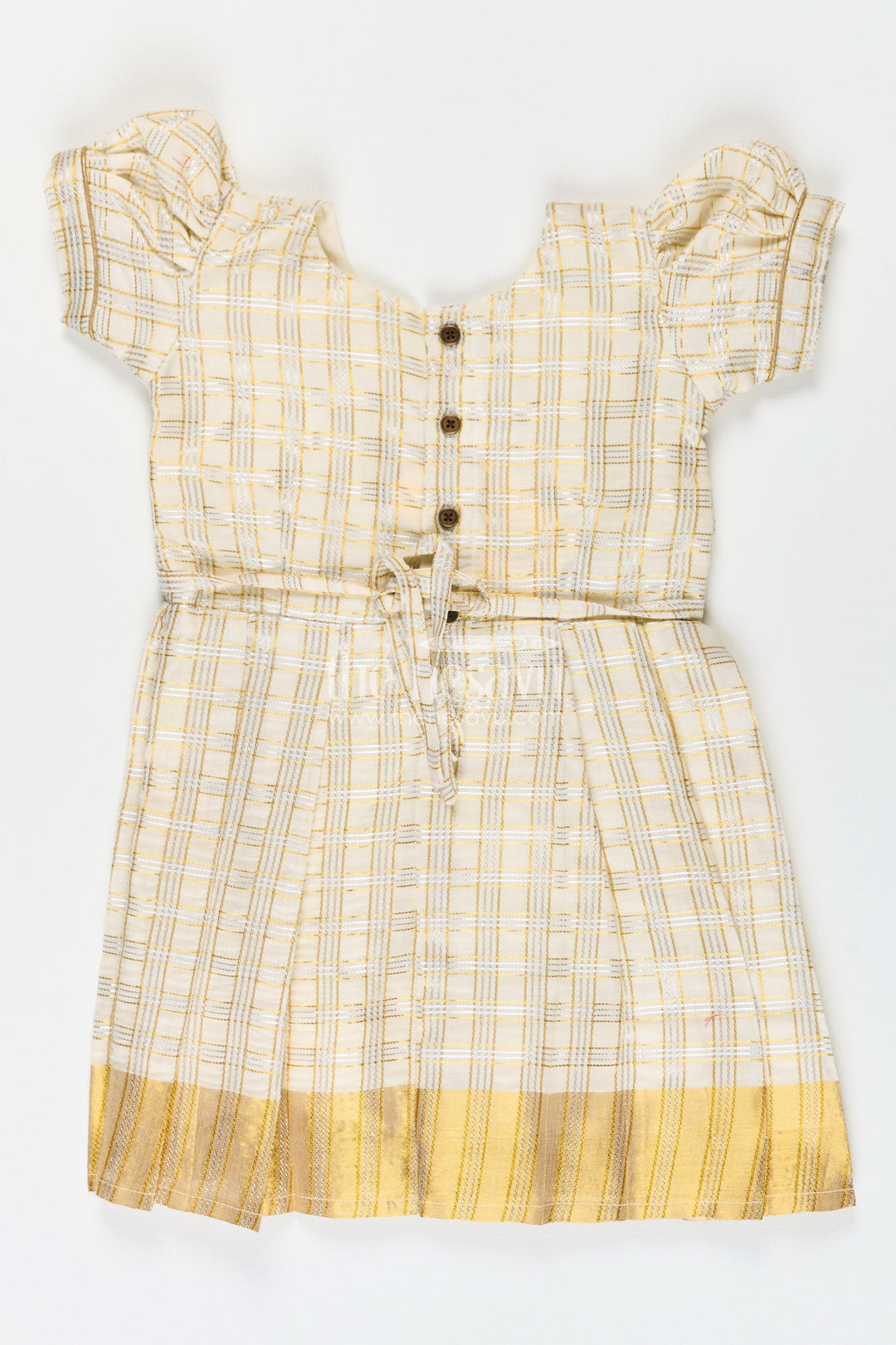 The Nesavu Silk Frock Girls Pattu Frock in Beige Tissue with Gold Bow and Checked Design for Festive Elegance Nesavu Nesavu Girls Pattu Frock Beige Silk Gold Checked Weave Bow Embellishment