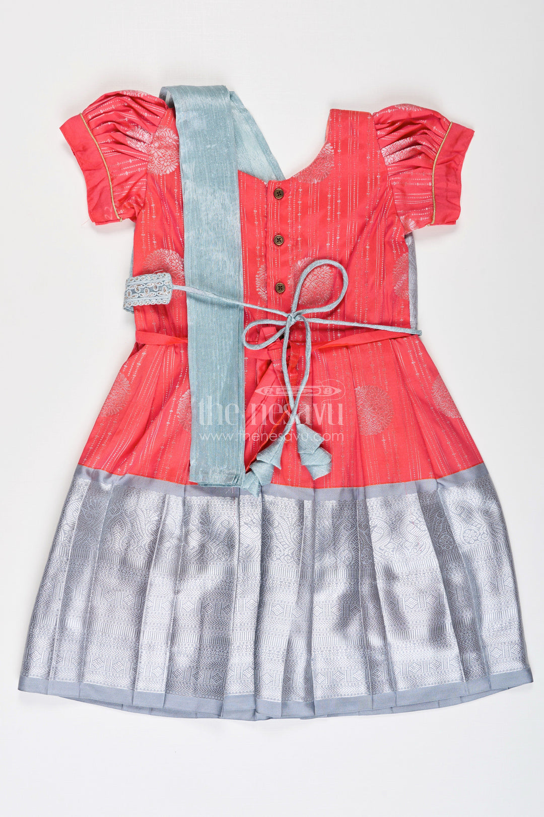 The Nesavu Girls Kanchi Silk Frock Girls Pattu Frock Model in Blue Semi Kanchivaram Silk with Red Accents and Lace Embellished Dupatta Nesavu Nesavu Girls Pattu Frock Model in Blue Semi Kanchivaram Silk with Red Accents and Embroidered Dupatta