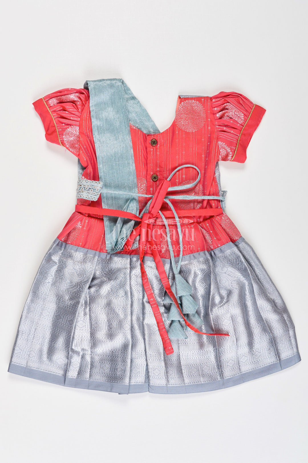 The Nesavu Girls Kanchi Silk Frock Girls Pattu Frock Model in Blue Semi Kanchivaram Silk with Red Accents and Lace Embellished Dupatta Nesavu Nesavu Girls Pattu Frock Model in Blue Semi Kanchivaram Silk with Red Accents and Embroidered Dupatta