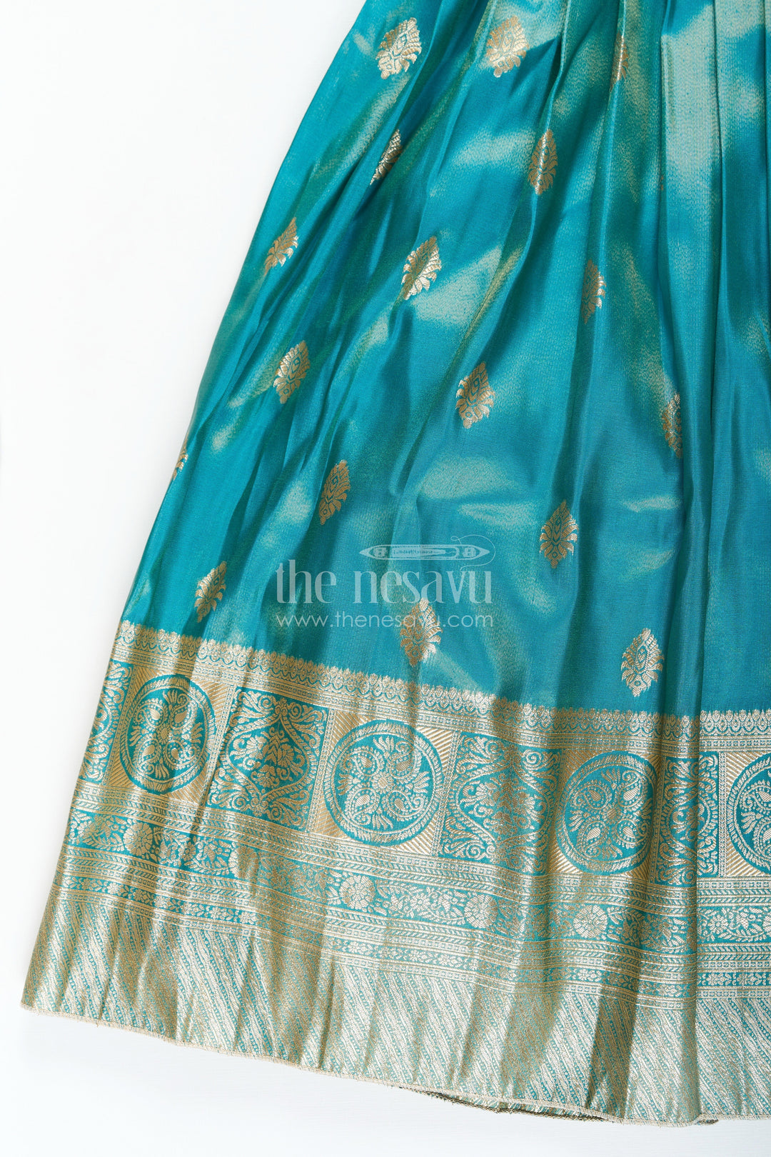 The Nesavu Girls Silk Gown Girls Pattu Gown in Banarasi Silk Blend Jacquard with Zari Big Border and Puff Sleeves for Festive Flair Nesavu Traditional Girls Pattu Gown in Banarasi Silk Blend Jacquard with Zari Border and Puff Sleeves | The Nesavu
