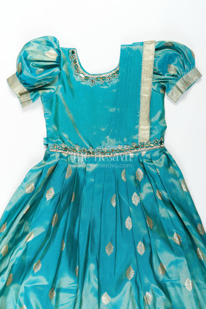 The Nesavu Girls Silk Gown Girls Pattu Gown in Banarasi Silk Blend Jacquard with Zari Big Border and Puff Sleeves for Festive Flair Nesavu Traditional Girls Pattu Gown in Banarasi Silk Blend Jacquard with Zari Border and Puff Sleeves | The Nesavu