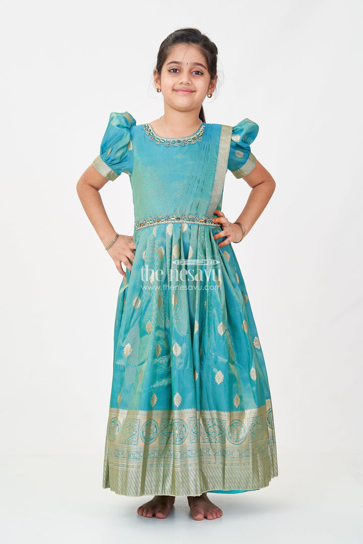 The Nesavu Girls Silk Gown Girls Pattu Gown in Banarasi Silk Blend Jacquard with Zari Big Border and Puff Sleeves for Festive Flair Nesavu Traditional Girls Pattu Gown in Banarasi Silk Blend Jacquard with Zari Border and Puff Sleeves | The Nesavu
