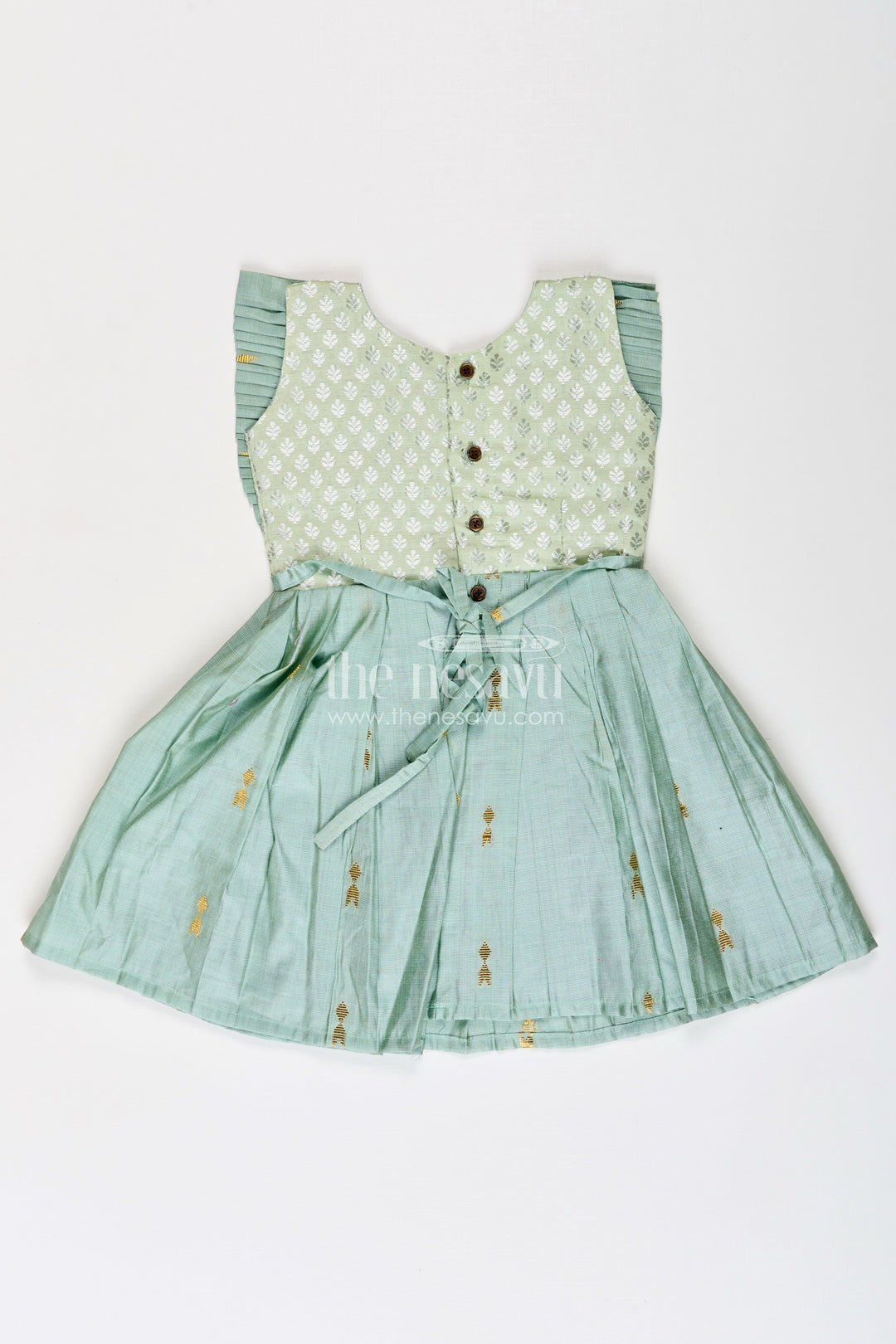 The Nesavu Silk Frock Girls Pattu Long Frocks Designs in Green Viscose with Semi Banaras Yoke and Pleated Details Nesavu Nesavu Pattu Long Frocks Designs Green Viscose Banaras Yoke Pleated Skirt