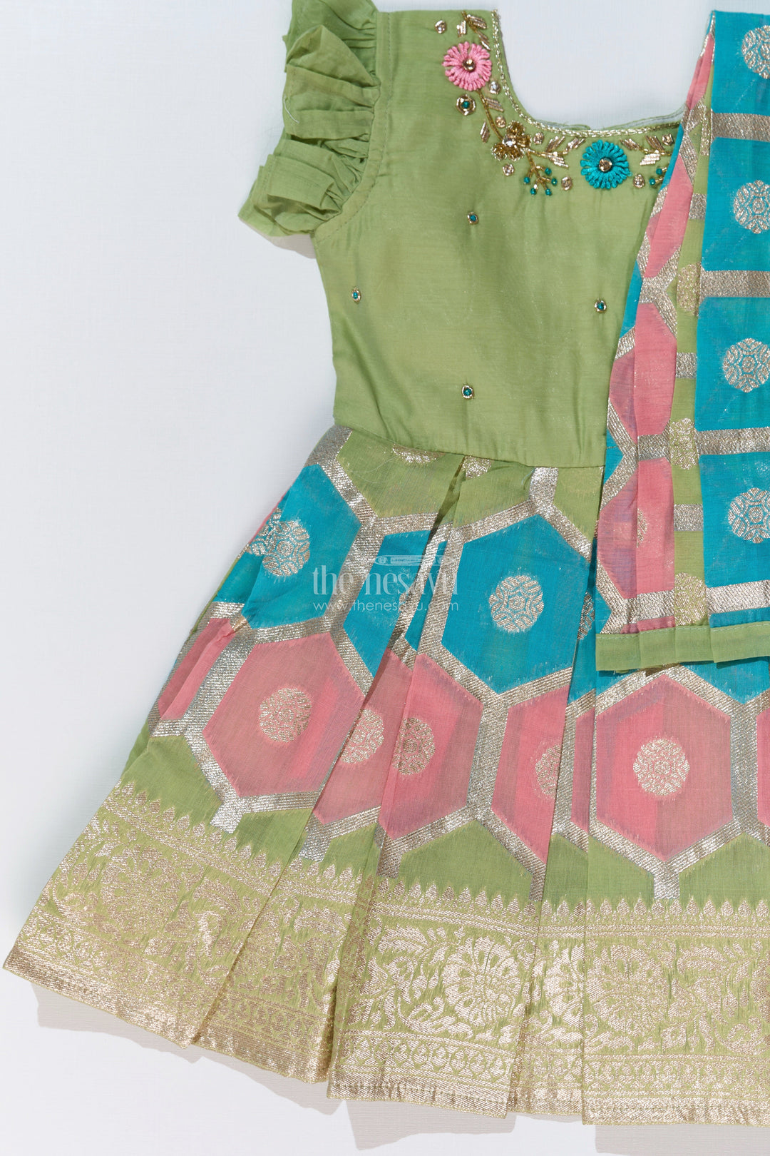 The Nesavu Silk Party Frock Girls Pattu Saree To Frock with Floral Embroidery and Rich Zari Border Nesavu Girls Pattu Saree to Frock Floral Embroidery Zari Pleated Skirt | The Nesavu