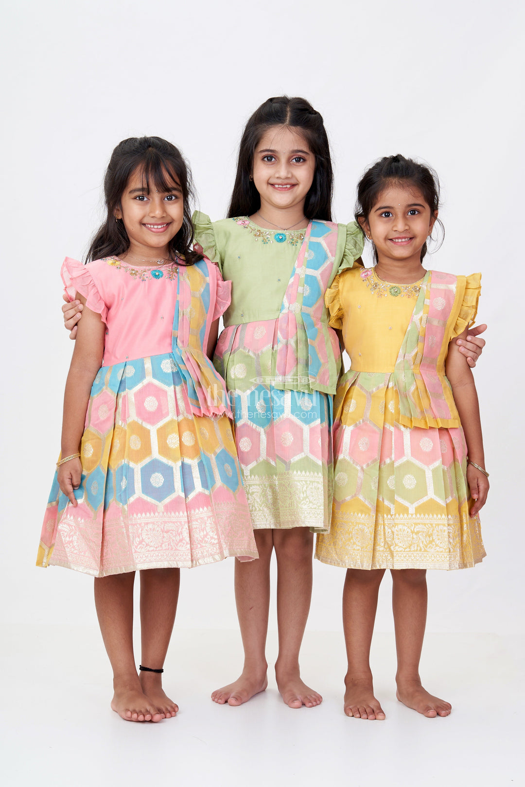 The Nesavu Silk Party Frock Girls Pattu Saree To Frock with Floral Embroidery and Rich Zari Border Nesavu Girls Pattu Saree to Frock Floral Embroidery Zari Pleated Skirt | The Nesavu