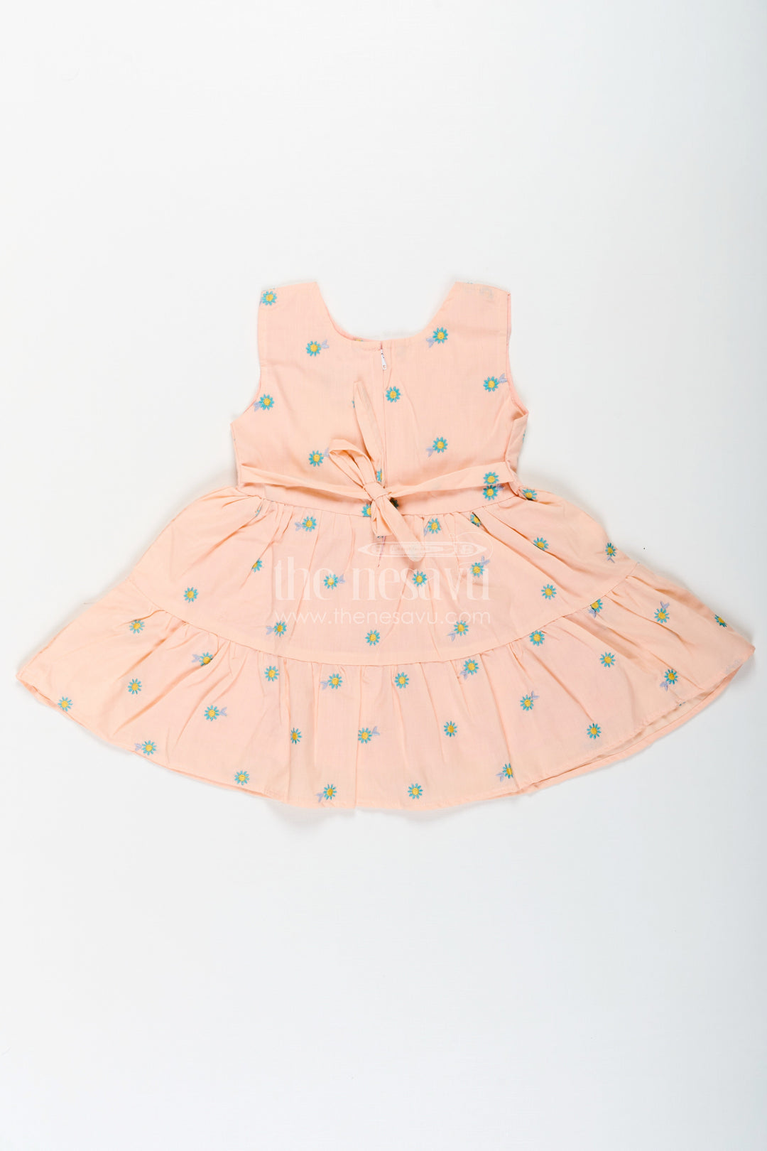 The Nesavu Baby Cotton Frocks Girls Peach Casual Dress Sleeveless in Soft Cotton with Daisy Embroidery and Blue Appliqué Nesavu Peach Sleeveless Casual Dress Girls Cotton Floral Embroidery Blue Appliqu | The Nesavu