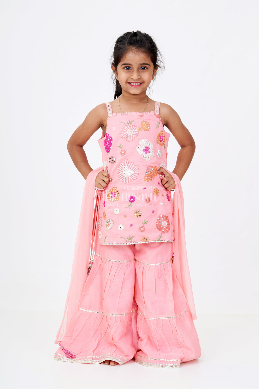 The Nesavu Girls Sharara / Plazo Set Girls Peach Color Sharara with Floral Thread Embroidery and Spaghetti Strap Top in Soft Cotton Nesavu Girls Peach Cotton Sharara Set Floral Embroidered Sleeveless Top Flared Pants | The Nesavu