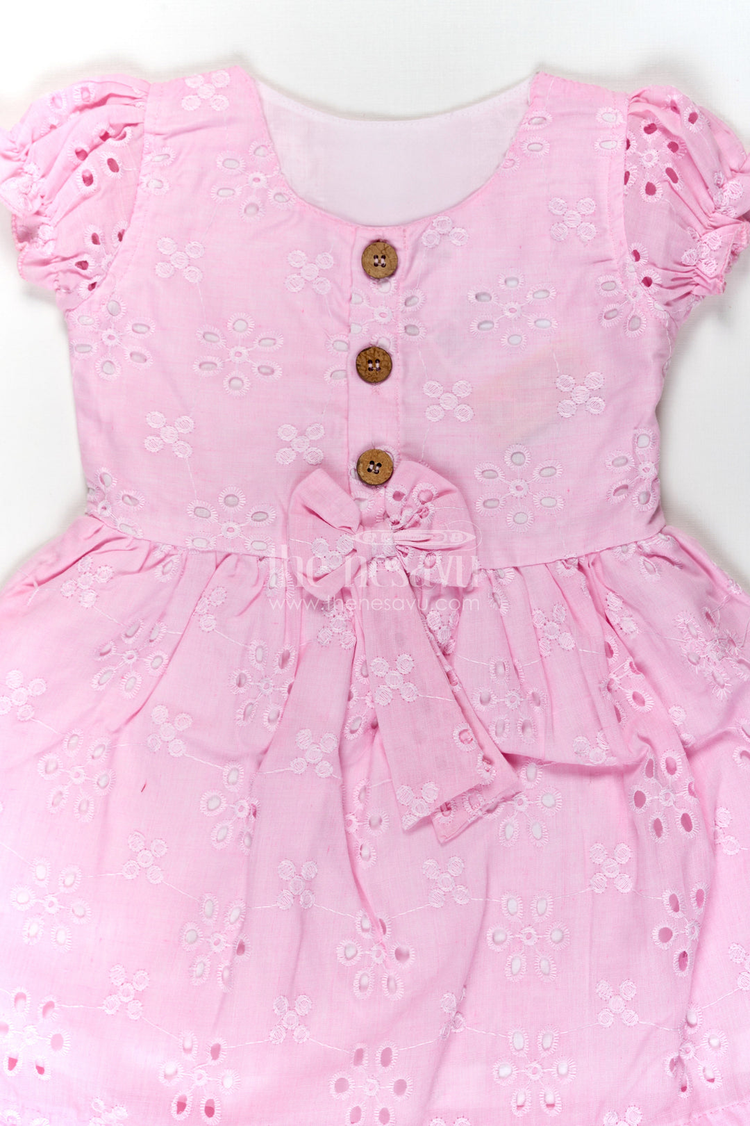 The Nesavu Girls Cotton Frock Girls Pink Cotton Dress with Hakoba Floral Embroidery and Puff Sleeves for Everyday Wear Nesavu Pink Cotton Dress for Girls with Hakoba Embroidery and Bow Belt for Everyday Comfort | The Nesavu