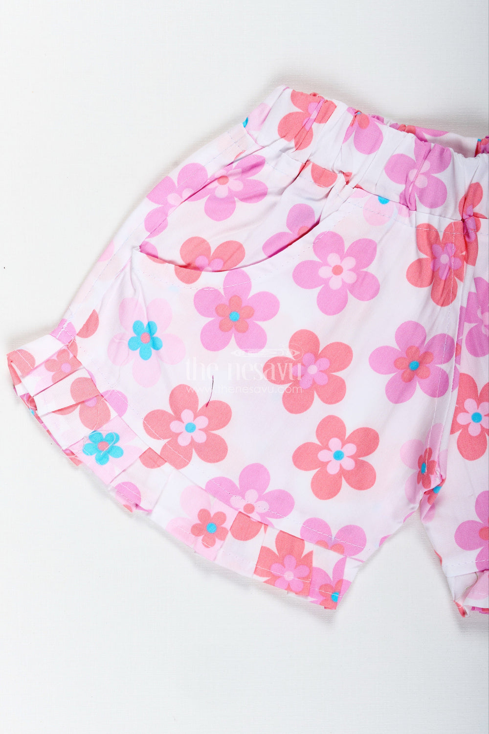 The Nesavu Girls Shorts Girls Pink Floral Cotton Shorts with Pleated Hem for Playful Summer Wear Nesavu Nesavu Girls Floral Cotton Shorts Pink Lightweight Summer Shorts Pleated Trim