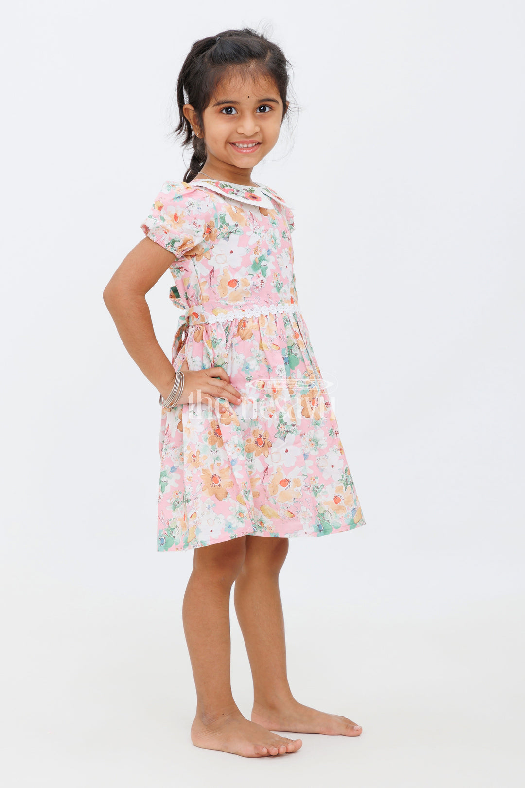 The Nesavu Girls Cotton Frock Girls Pink Floral Peter Pan Collar Dress with Puff Sleeves and Lace Band - Party Short Frock Nesavu Nesavu Girls Pink Floral Frock Peter Pan Collar Puff Sleeves - Short Party Dress