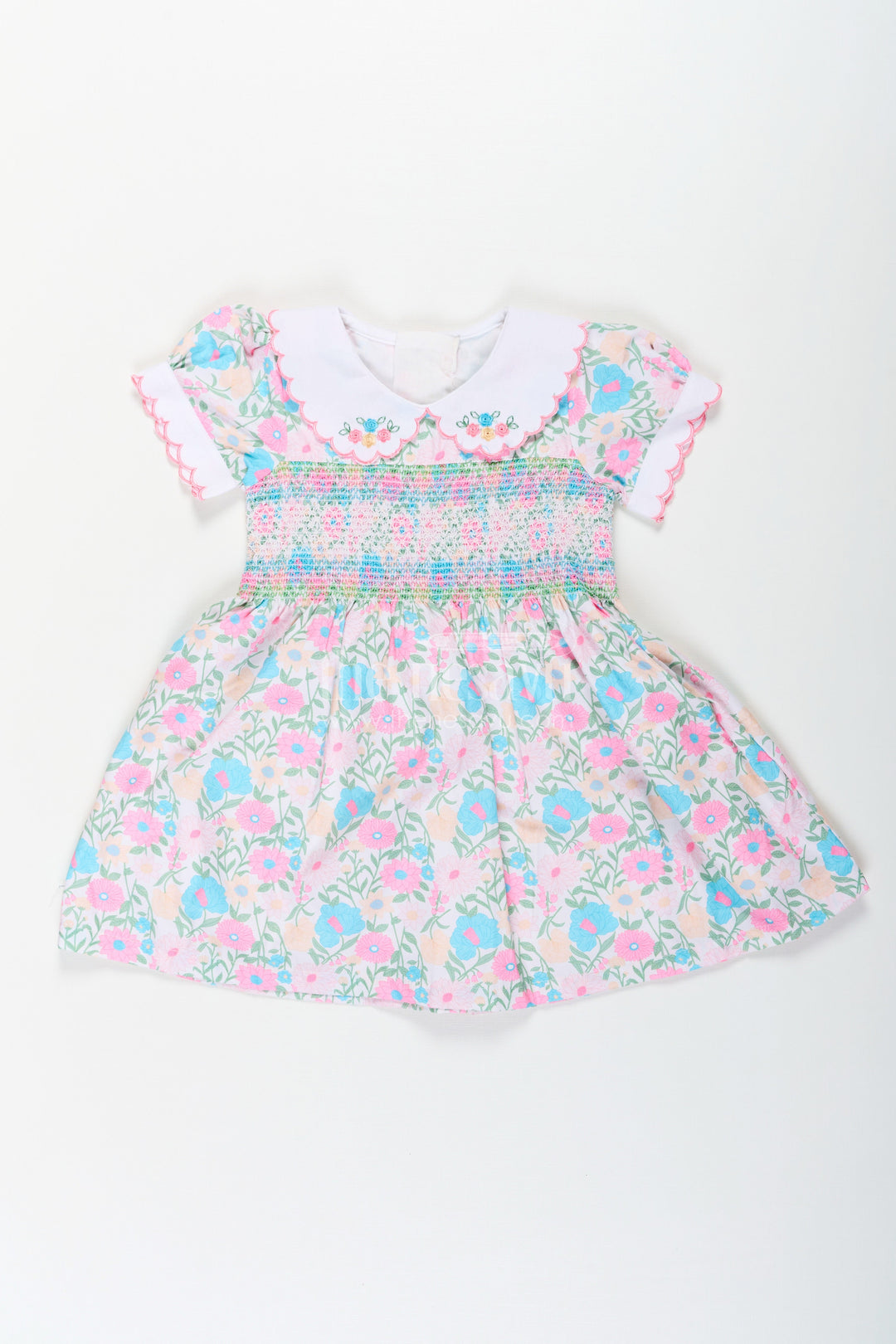 The Nesavu Girls Cotton Frock Girls Pink Flower Print Dress in Cotton with Embroidered Collar and Smocking for a Sweet Vintage Look Nesavu 18 (2Y) / Pink GFC1681A-18 Girls Cotton Pink Flower Print Dress Embroidered Collar Smocking Classic Comfort | The Nesavu