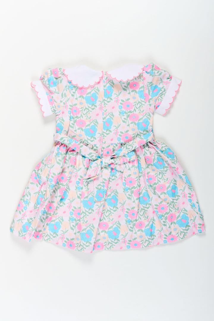 The Nesavu Girls Cotton Frock Girls Pink Flower Print Dress in Cotton with Embroidered Collar and Smocking for a Sweet Vintage Look Nesavu Girls Cotton Pink Flower Print Dress Embroidered Collar Smocking Classic Comfort | The Nesavu