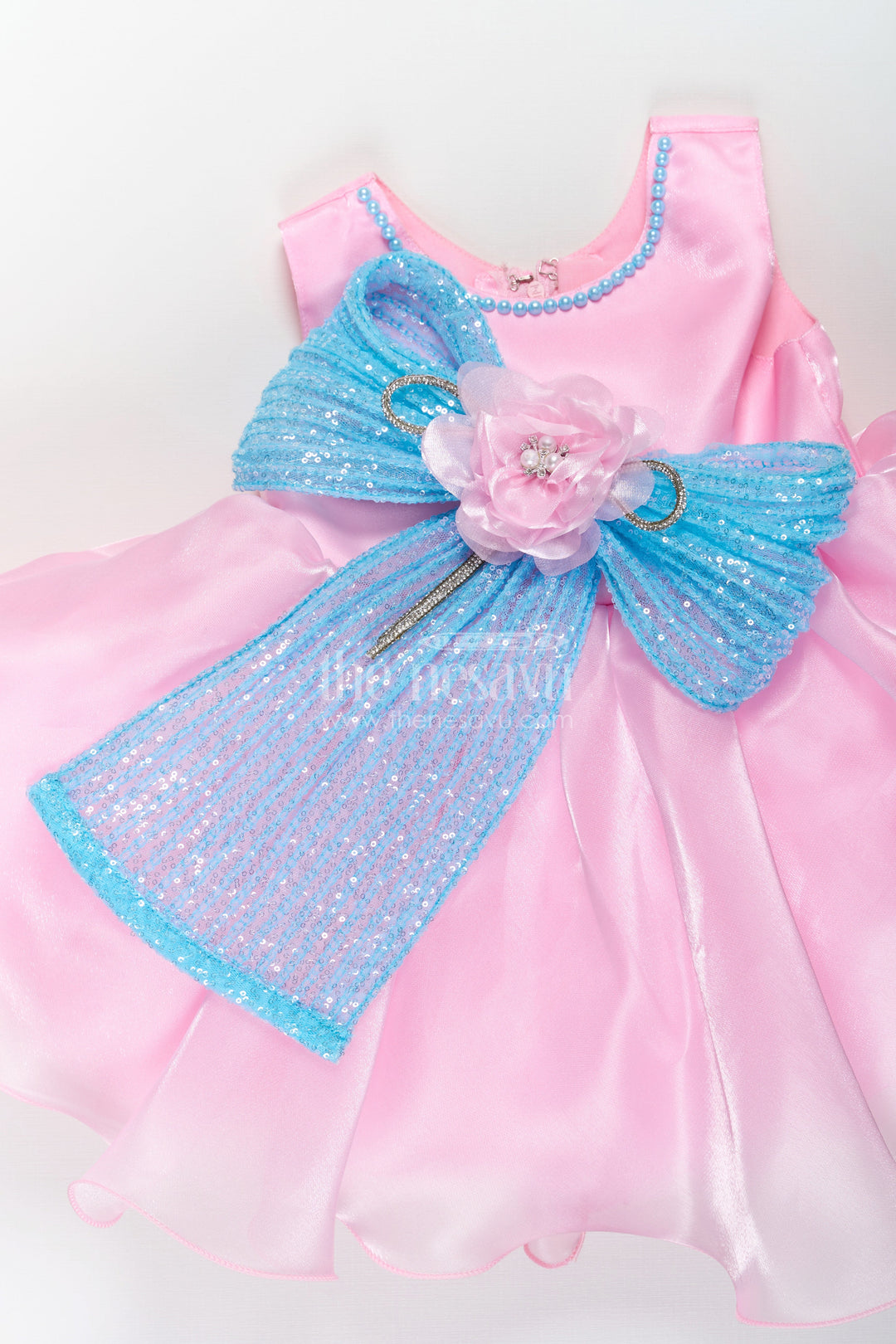 The Nesavu Girls Fancy Party Frock Girls Pink Net Frock with Blue Glitter Bow and Floral Accent in Glazed Organza Fabric Nesavu Girls Pink Net Frock Blue Glitter Bow Glazed Organza Party Wear | The Nesavu