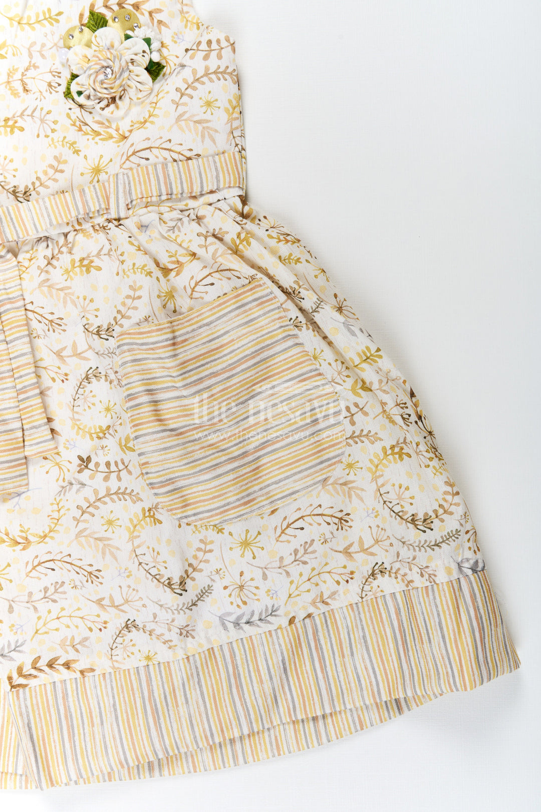 The Nesavu Girls Cotton Frock Girls Pocket Frocks in Flax Cotton with Yellow Floral Print and Bow Belt with Striped Details Nesavu Nesavu Girls Pocket Frocks Yellow Floral Flax Cotton Bow Belt Striped Hem