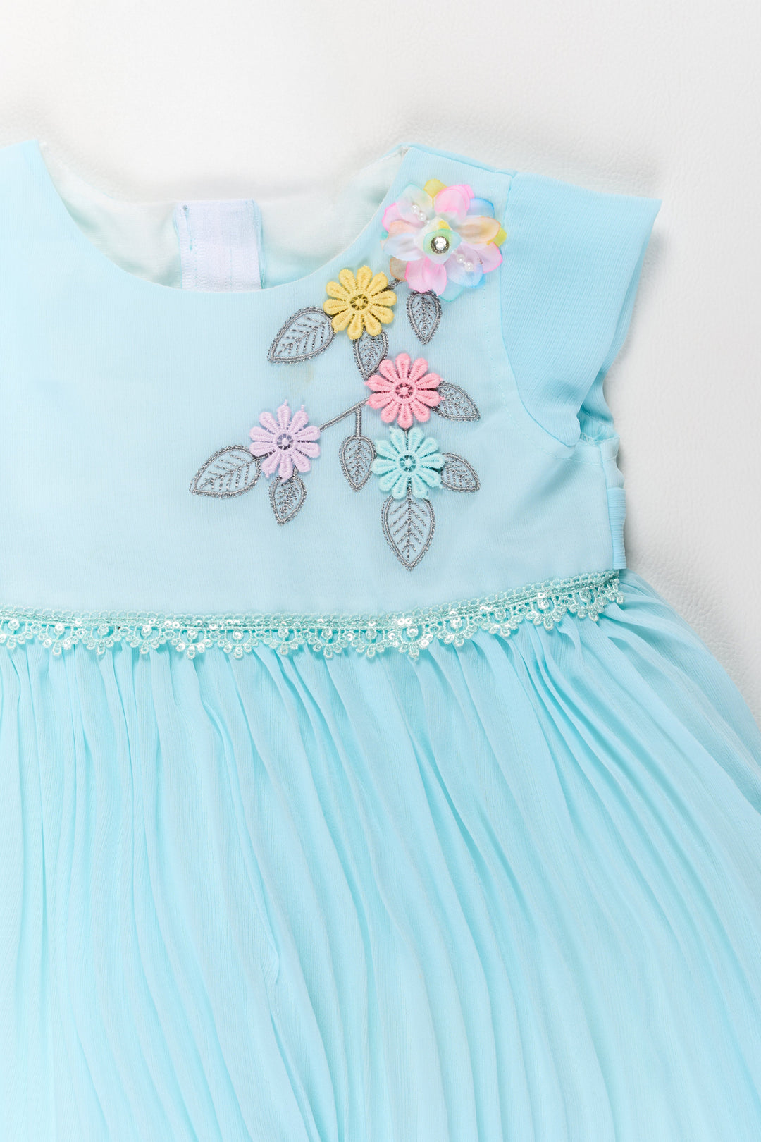 The Nesavu Girls Fancy Party Frock Girls Poly Georgette Frock in Aqua Blue with Floral Appliqué and Pleated Skirt Nesavu Girls Poly Georgette Frock Aqua Blue Floral Appliqu Pleated Skirt | The Nesavu