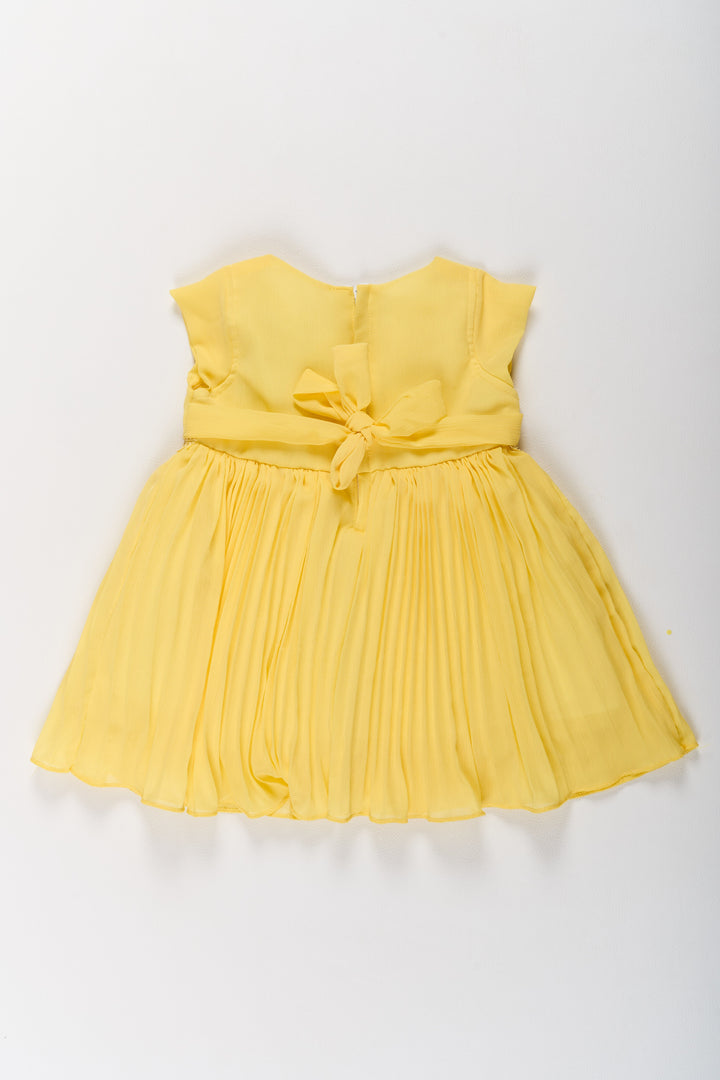 The Nesavu Girls Fancy Party Frock Girls Poly Georgette Frock in Sunshine Yellow with Floral Embellishments and Pleats Nesavu Girls Poly Georgette Frock Sunshine Yellow Floral Appliqu Weddings | The Nesavu