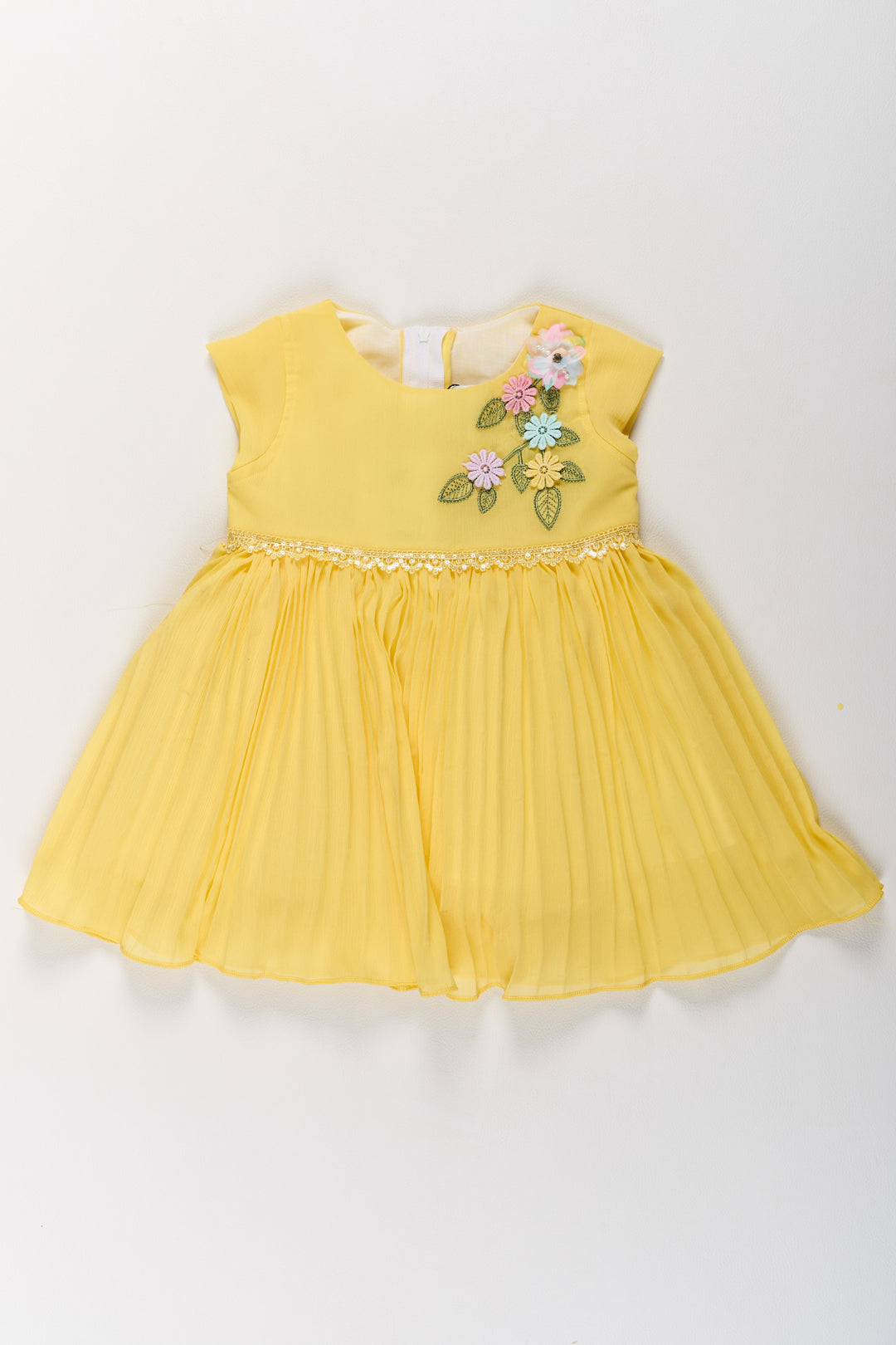 The Nesavu Girls Fancy Party Frock Girls Poly Georgette Frock in Sunshine Yellow with Floral Embellishments and Pleats Nesavu Girls Poly Georgette Frock Sunshine Yellow Floral Appliqu Weddings | The Nesavu