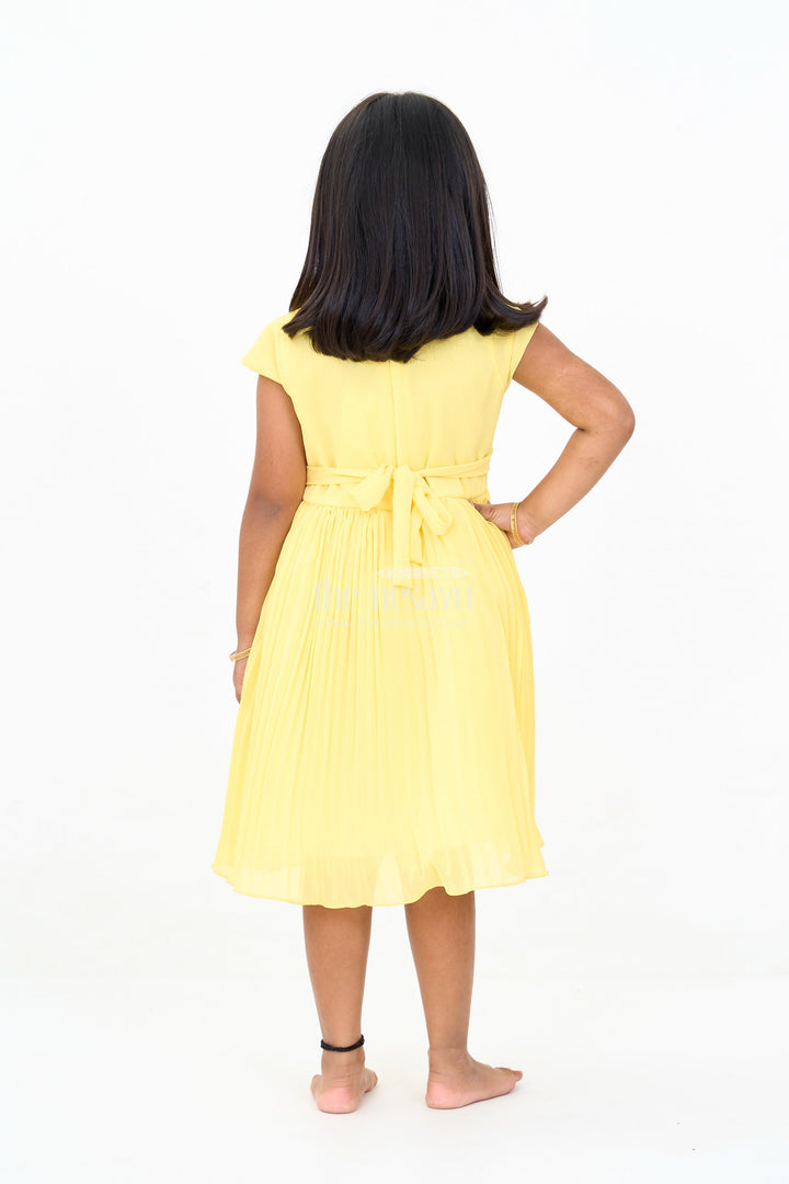 The Nesavu Girls Fancy Party Frock Girls Poly Georgette Frock in Sunshine Yellow with Floral Embellishments and Pleats Nesavu Girls Poly Georgette Frock Sunshine Yellow Floral Appliqu Weddings | The Nesavu